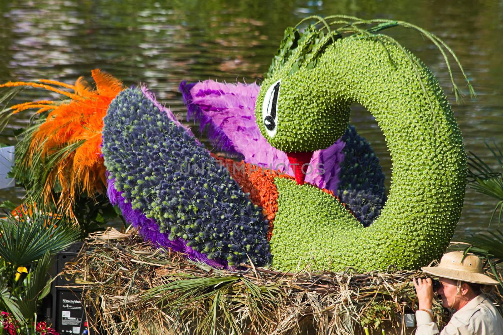 VLAARDINGEN, THE NETHERLANDS - JULI 2010: Beautiful flower boats in the unique annual Westland Floating Parade Juli 30, 2010, Vlaardingen, the Netherlands.

