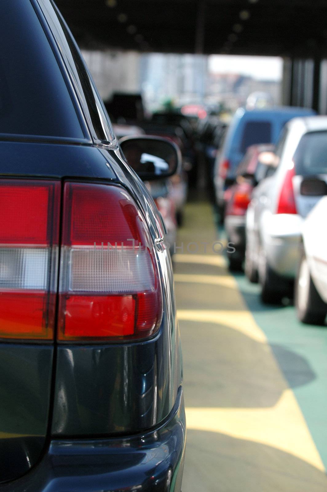 Cars waiting in the heavy traffic.