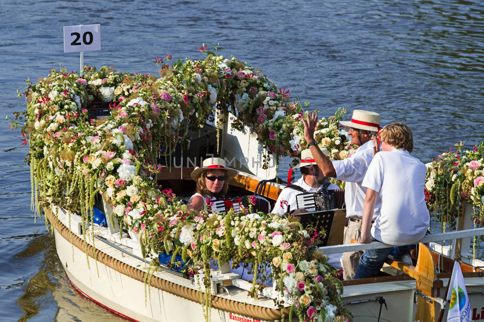 VLAARDINGEN, THE NETHERLANDS - JULI 2010: Beautiful flower boats in the unique annual Westland Floating Parade Juli 30, 2010, Vlaardingen, the Netherlands.


