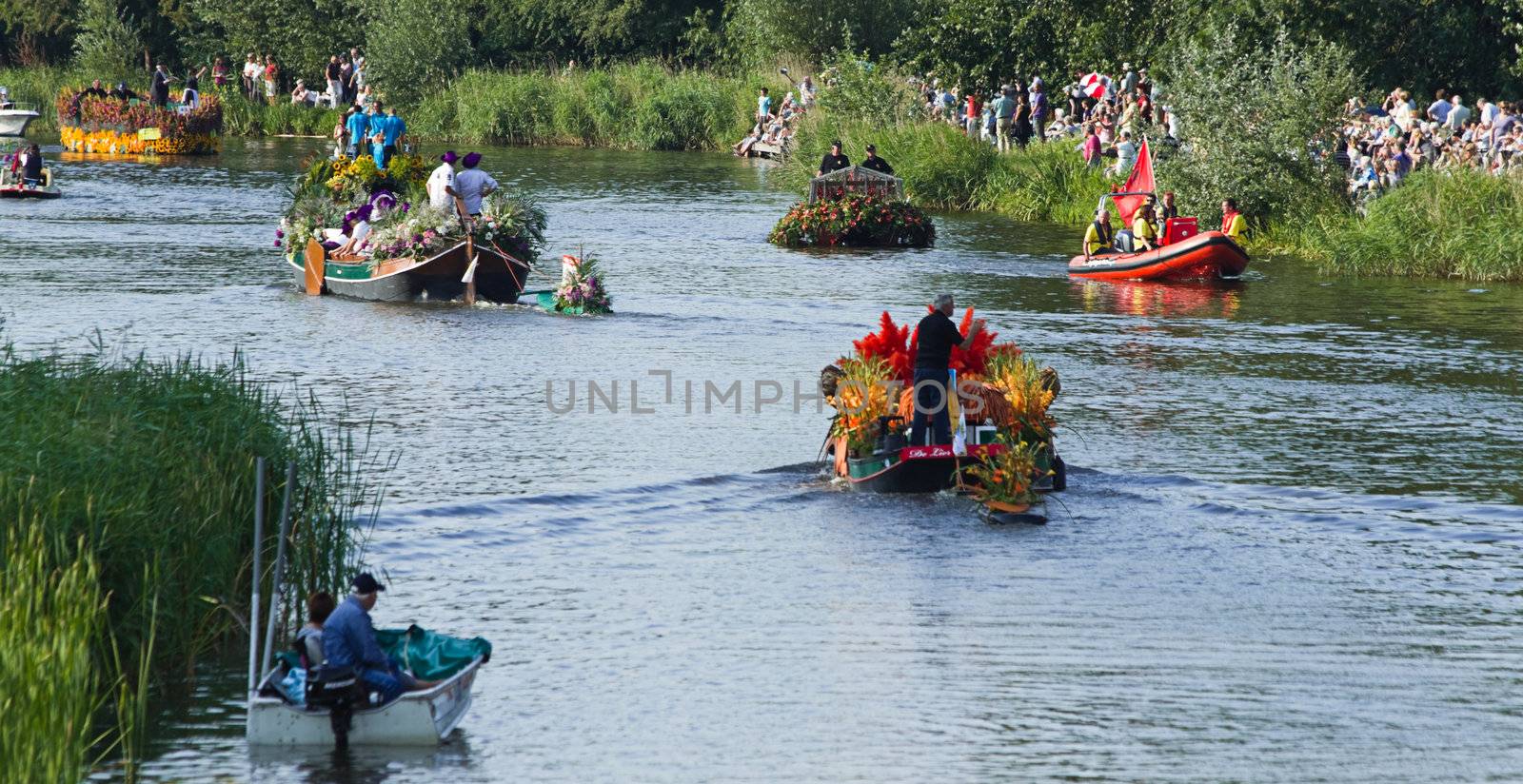 VLAARDINGEN, THE NETHERLANDS - JULI 2010: Beautiful flower boats in the unique annual Westland Floating Parade Juli 30, 2010, Vlaardingen, the Netherlands.

