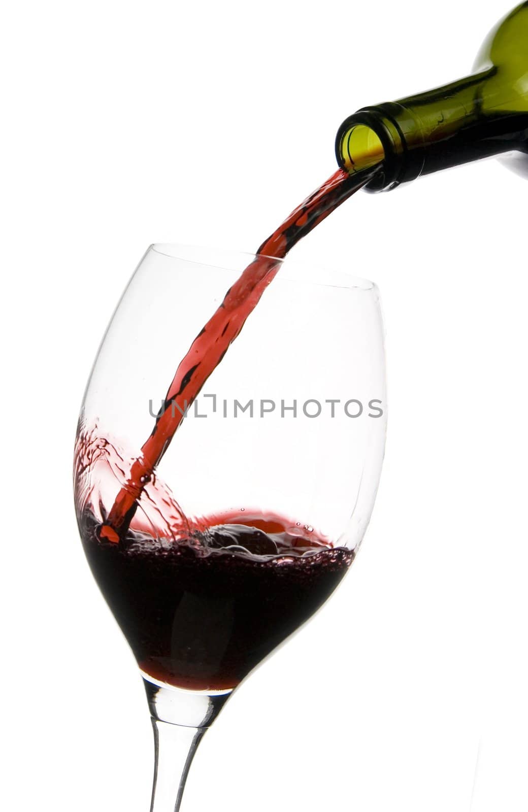 a clear glass of red wine isolated on white background