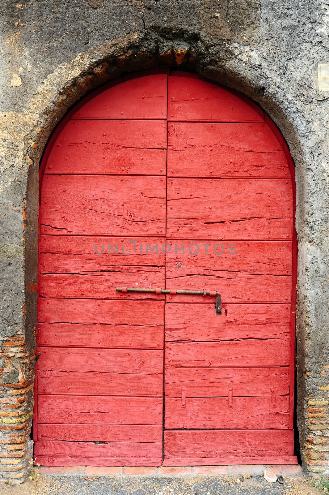 Close-up Image Of Red Wooden Ancient Italian Door