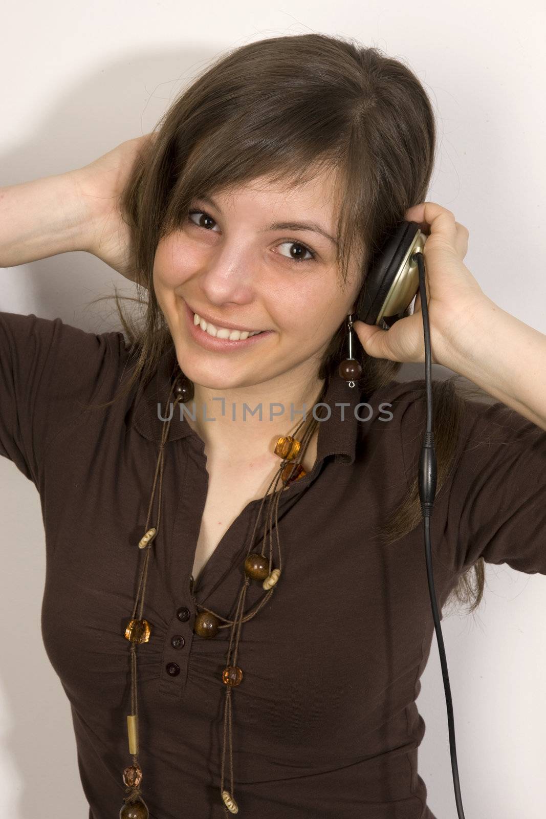 Relaxed young woman listening music 