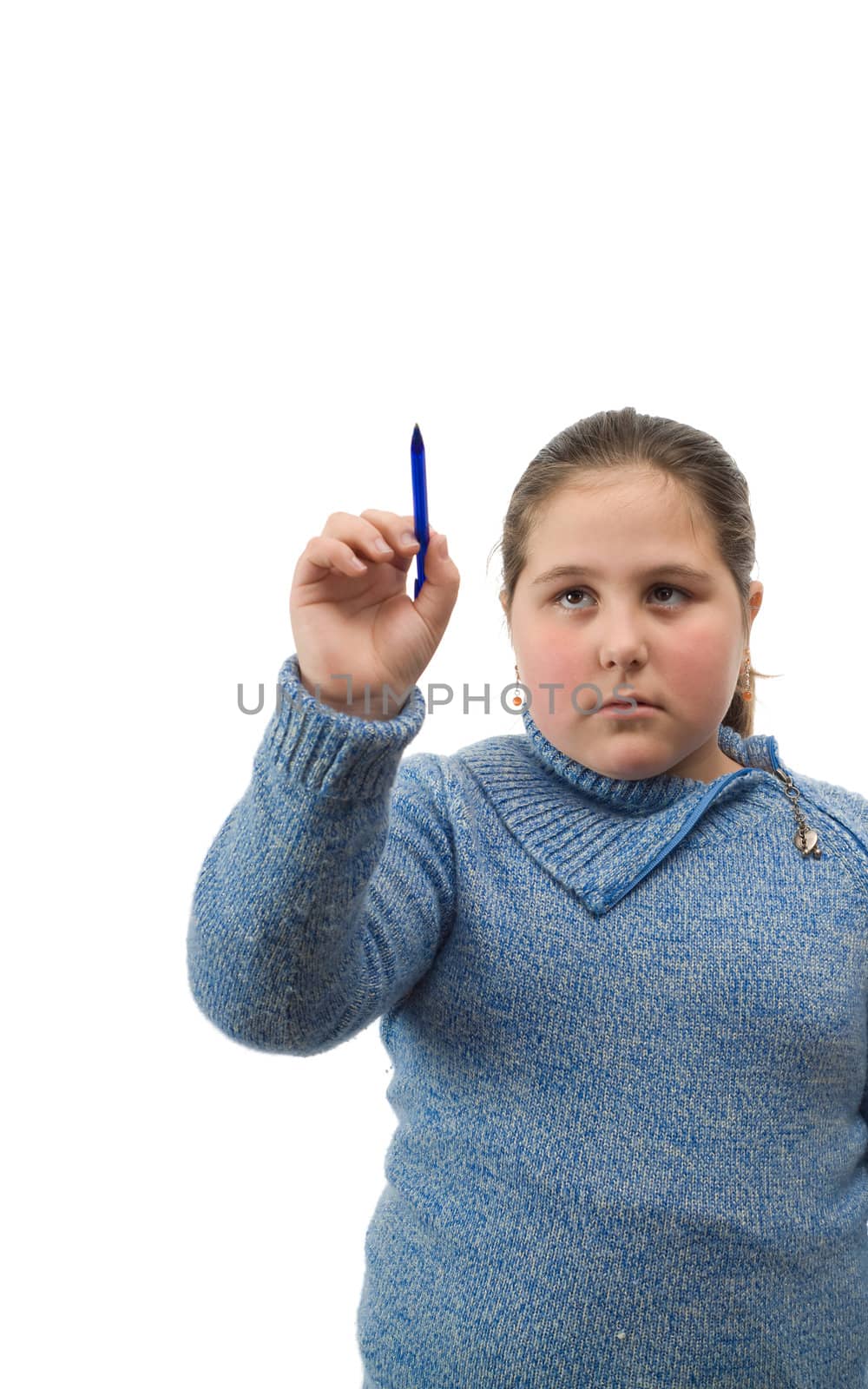 A young female child holding a pen and writing  your text on white