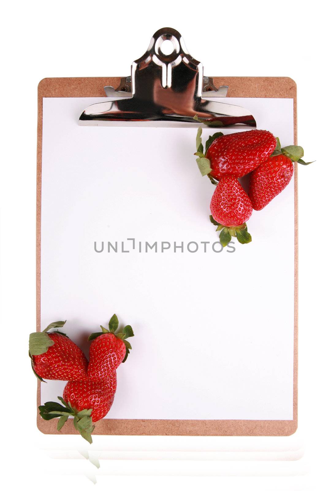 Strawberries on clipboard, healthy snack concept, isolated on white