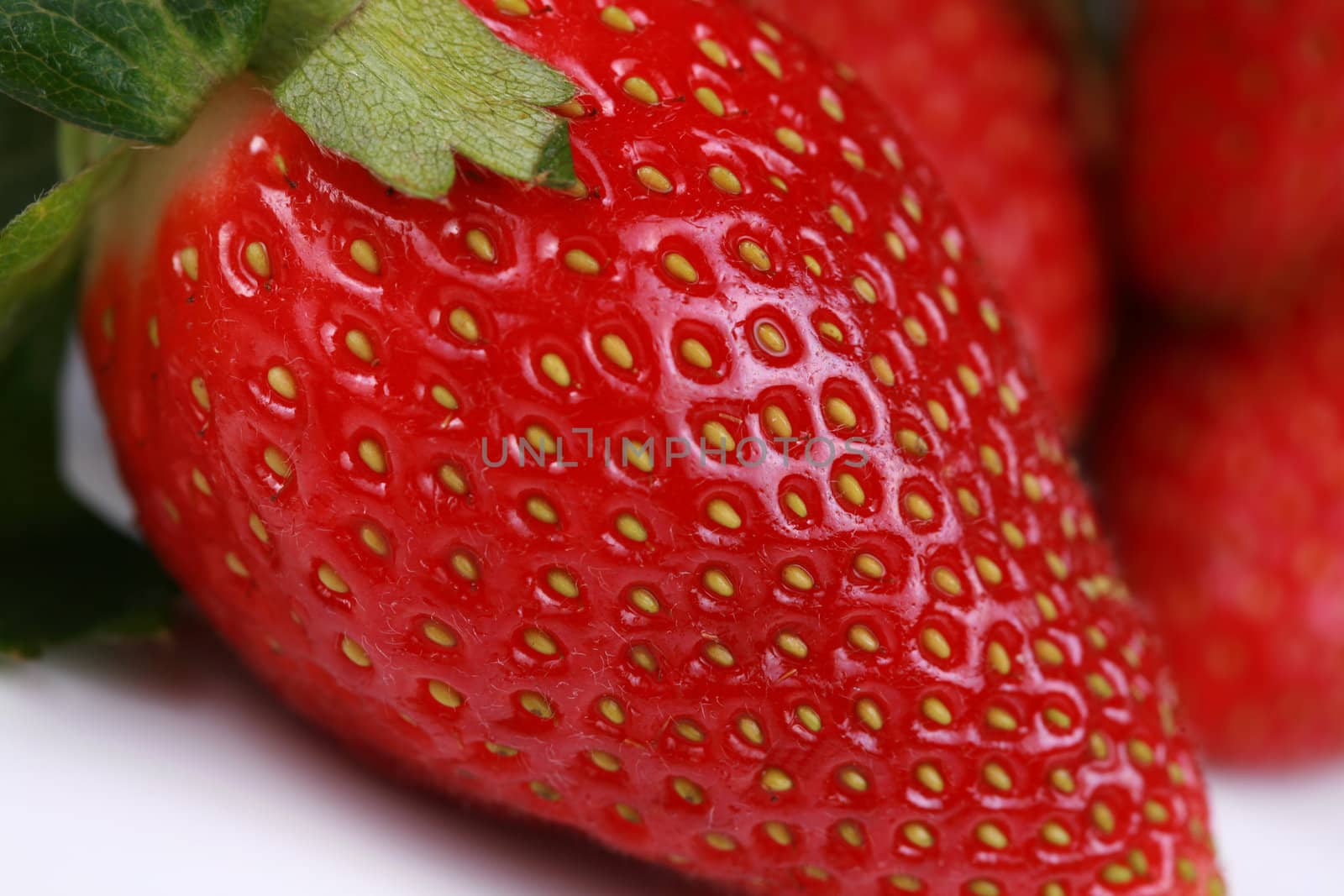 Close up of red strawberry by jarenwicklund