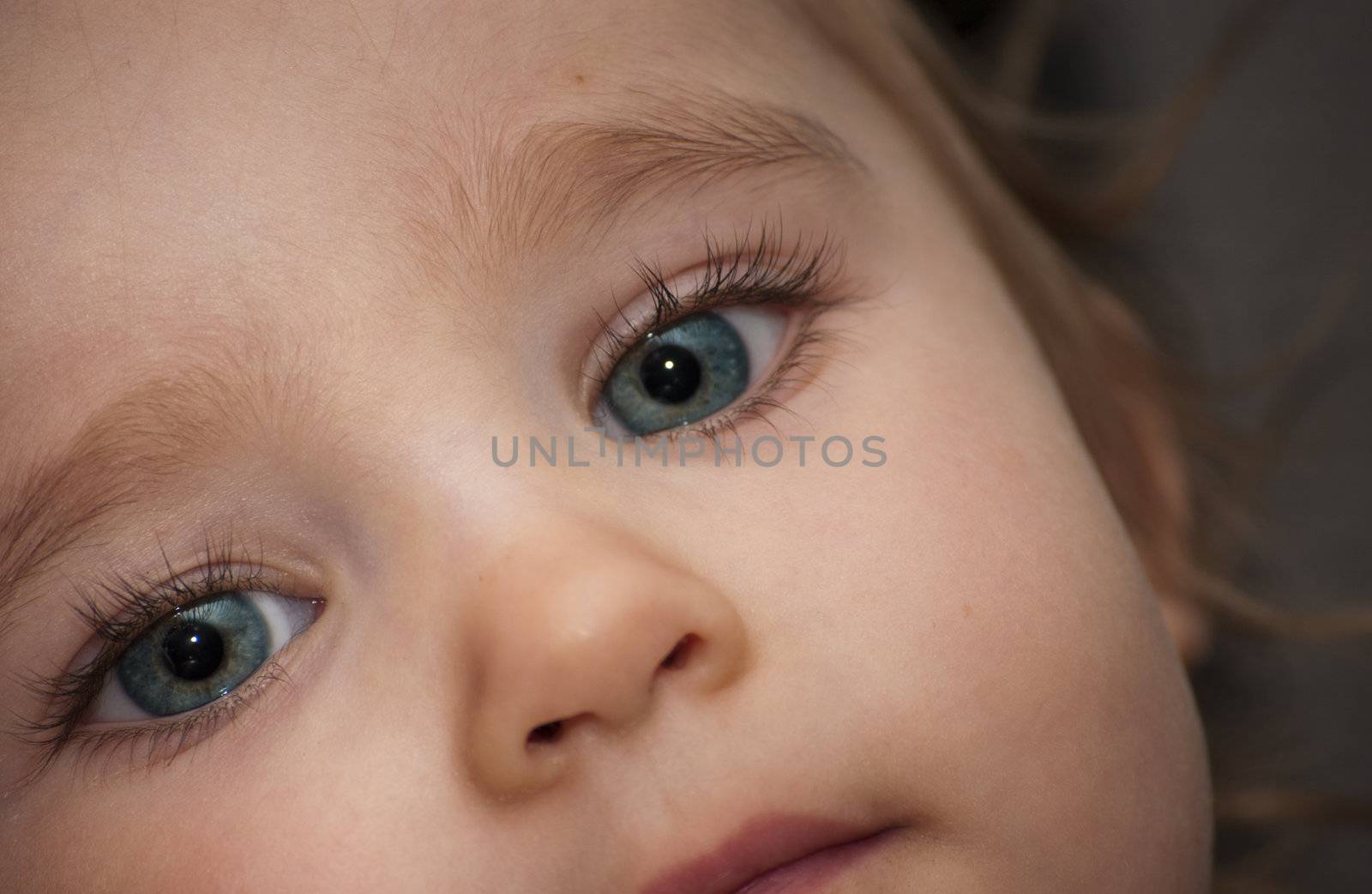Big blue eyed baby girl