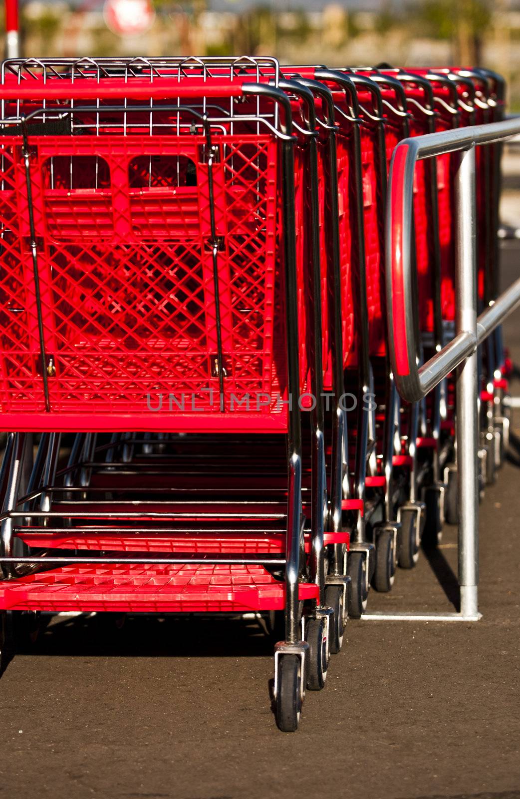 Red shopping carts at a shopping center 