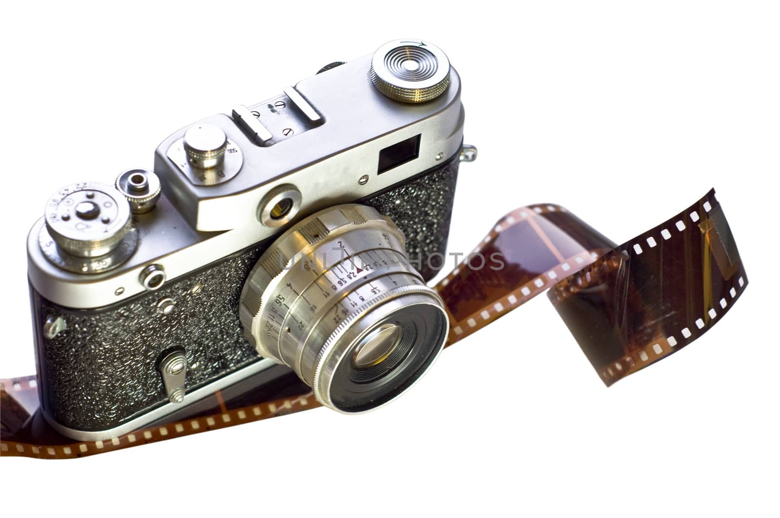 Retro film camera is shown on 35mm film. White background, isolation. Medium-format camera with interchangeable lenses.