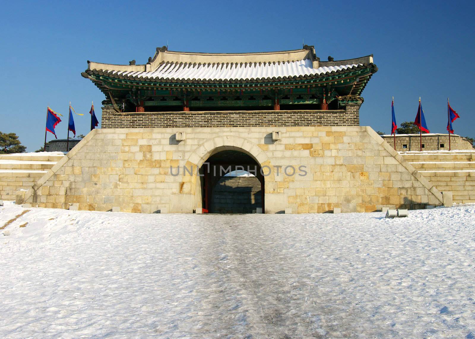 East Gate in the snow at Hwaseong Fortress, Suwon, South Korea.
