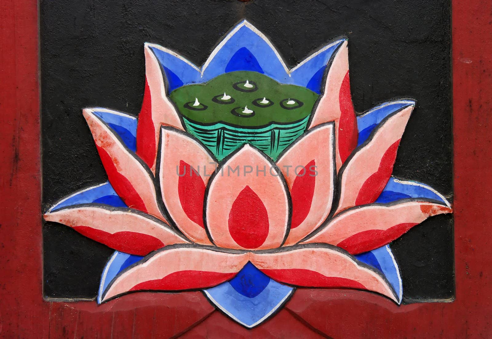 A close-up of a lotus flower painted on a Buddhist temple door. Busan, South Korea.

