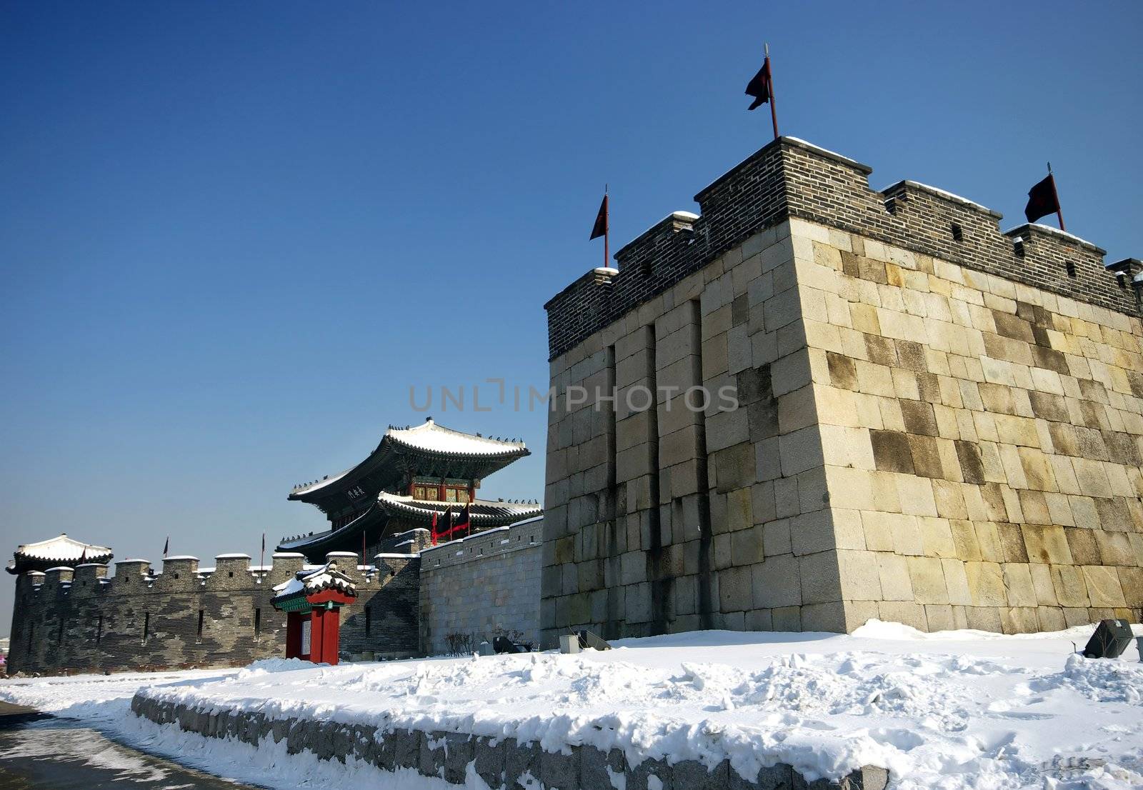 Hwaseong Fortress in the snow. Hwaseong is a UNESCO World Heritage site located in Suwon City, South Korea.