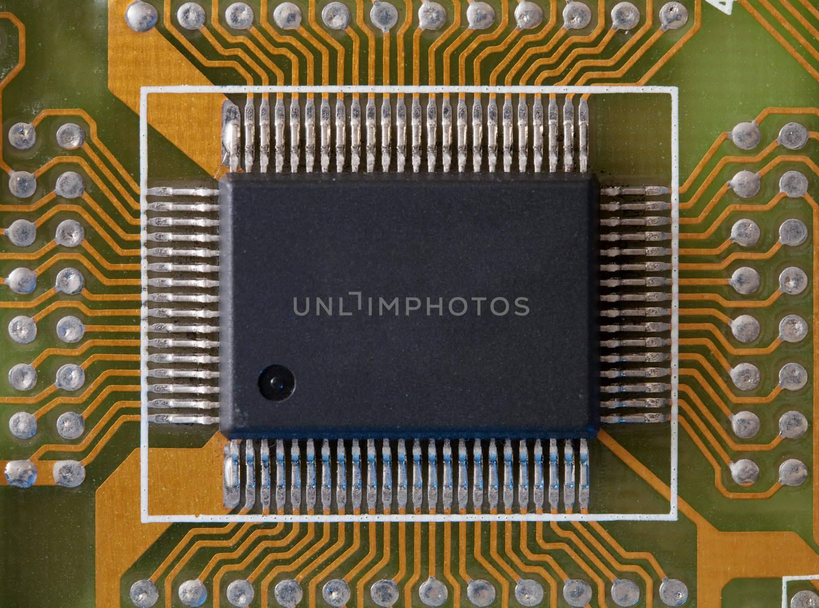 Microphoto of an integrated microcircuit of black colour