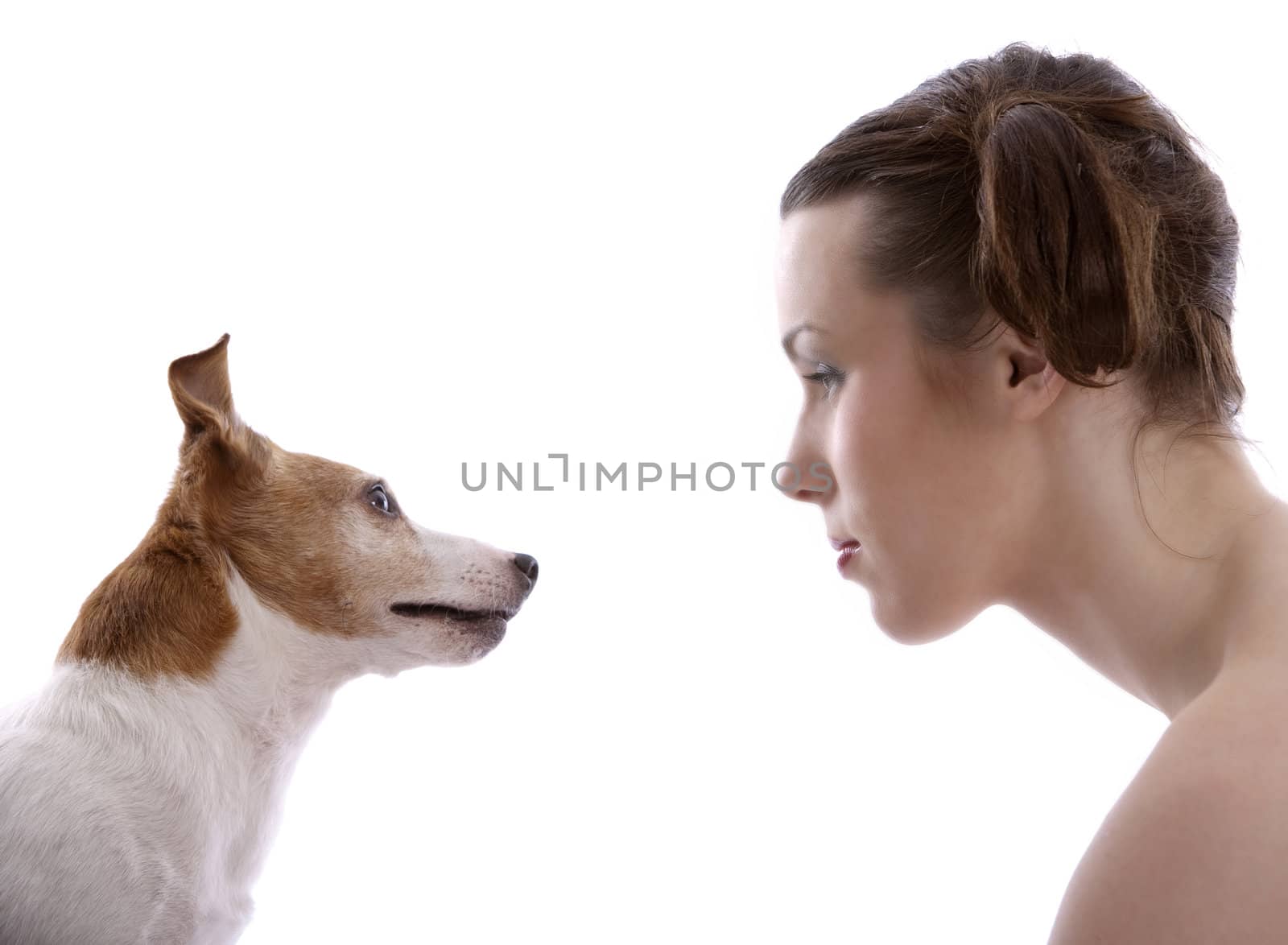 Girl and her dog looking at eachother