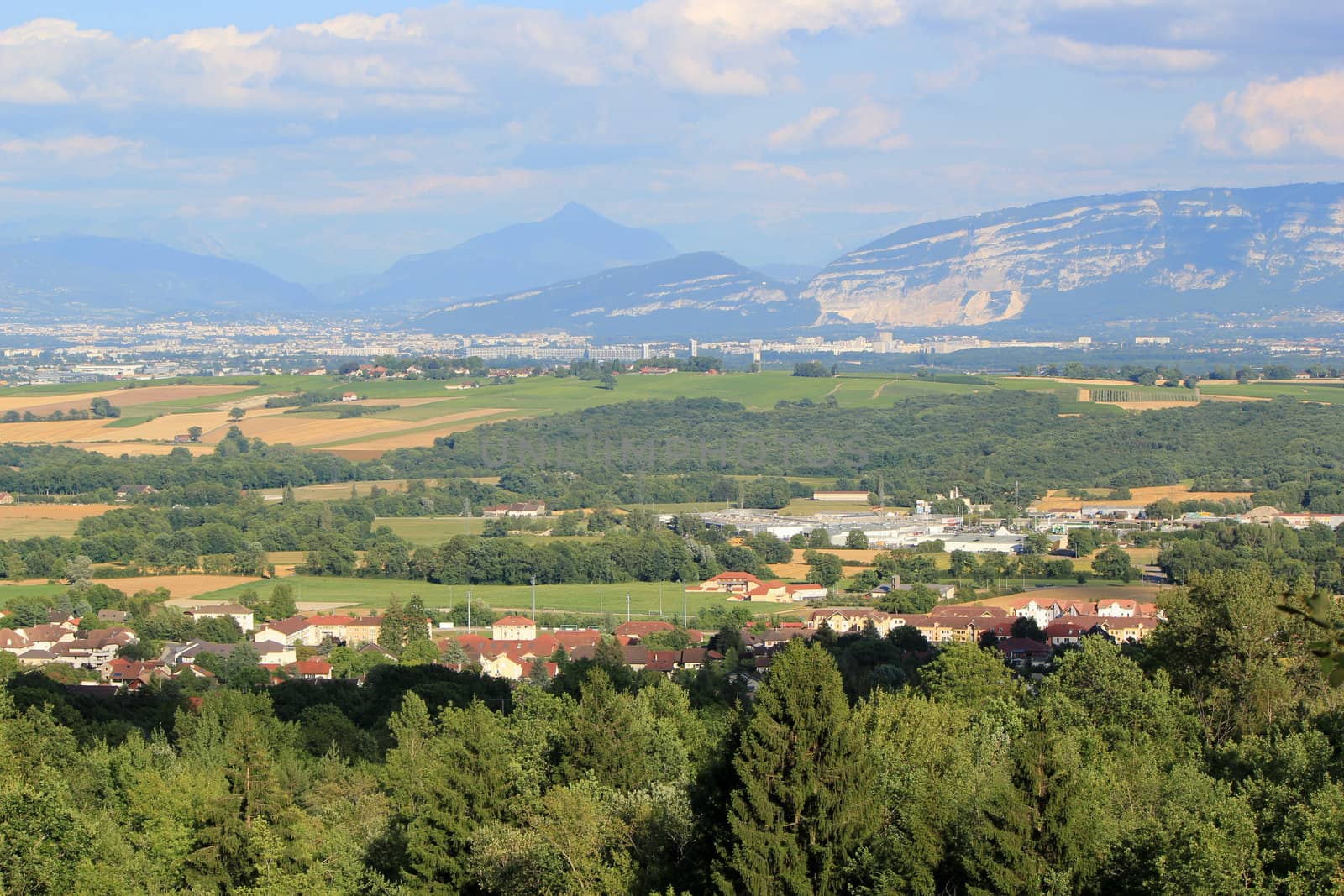 View of Geneva area with Saleve and Alps mountain by sunset, Switzerland