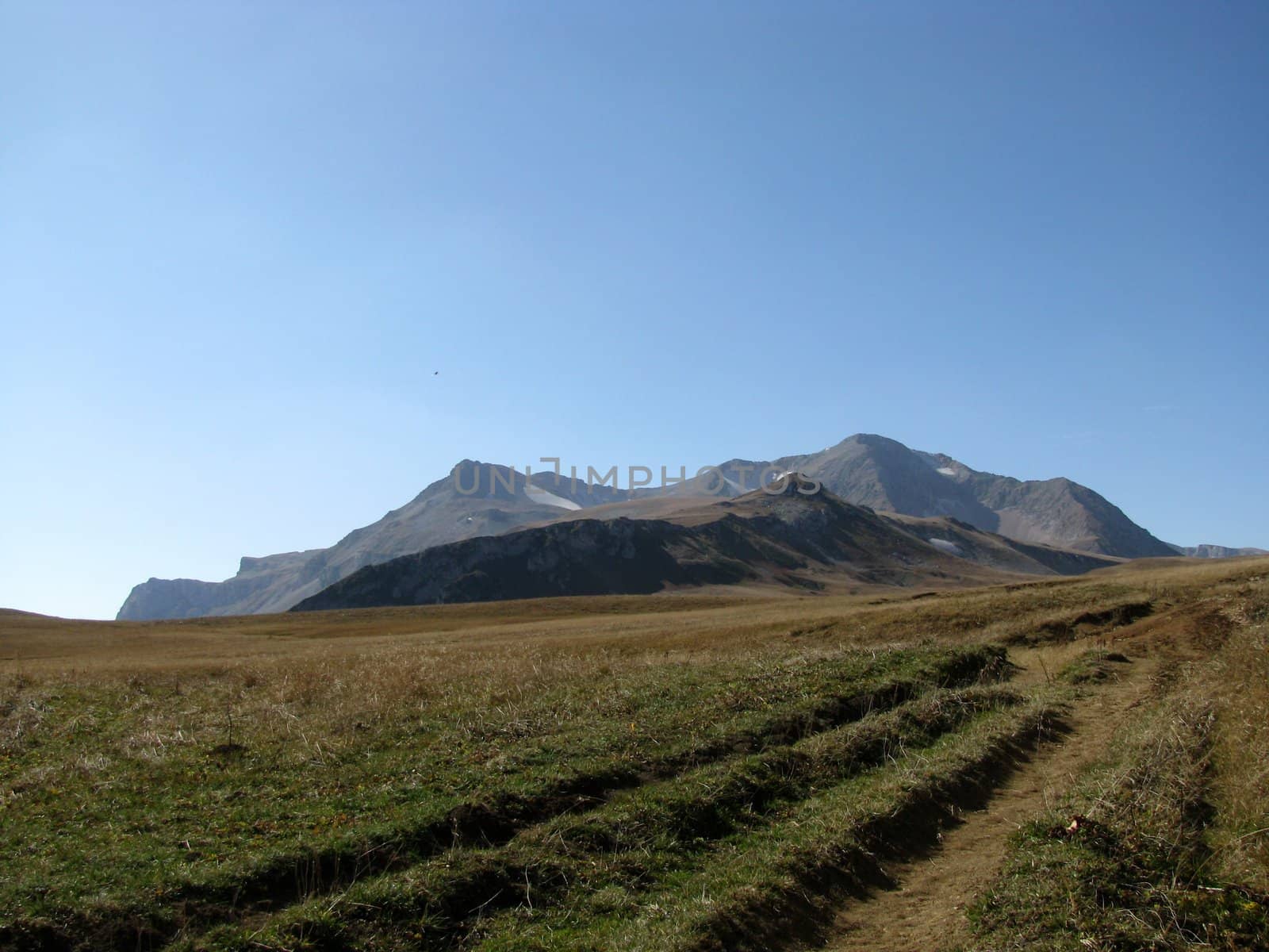 Mountains, caucasus, rocks, a relief, a landscape, the nature, a panorama, a landscape, a ridge, top, breed, the sky, reserve, a background, a kind, a route, the Alpine meadows, a glacier, snow, a track, a slope, peak, beauty, bright, a file, a grass, tourism, travel, autumnt