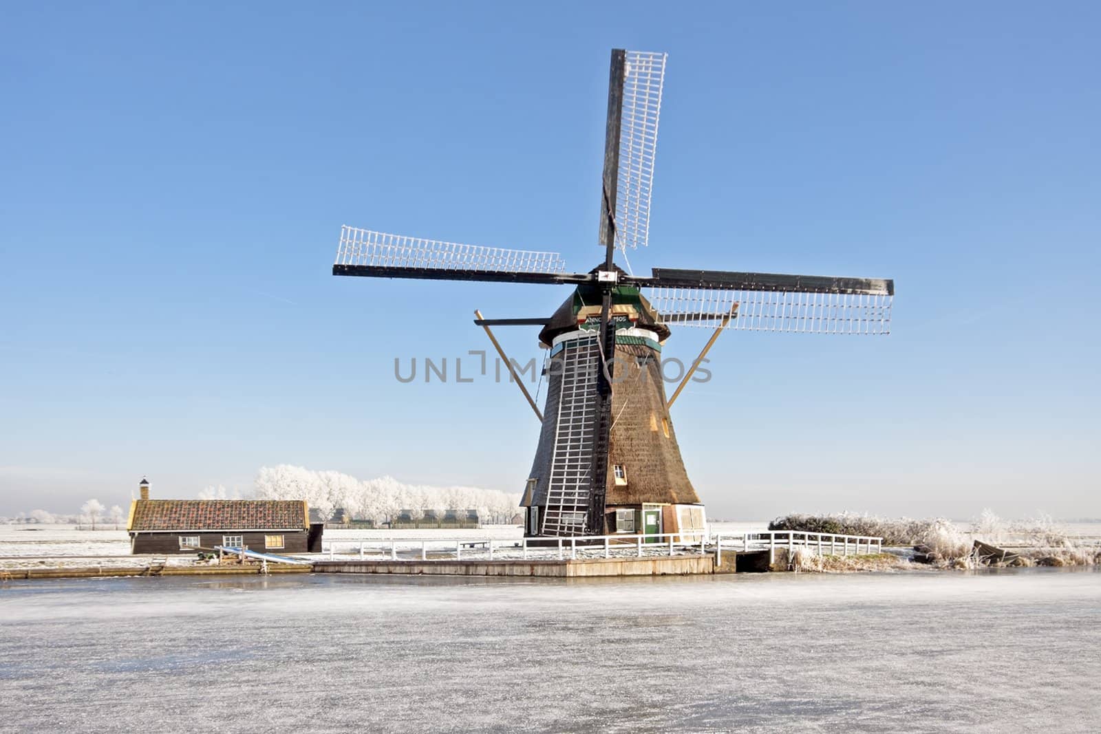 Windmill from 1803 in wintertime in the Netherlands   by devy