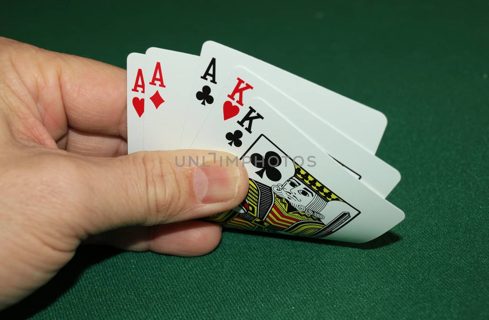 showing a great hand with aces and kings