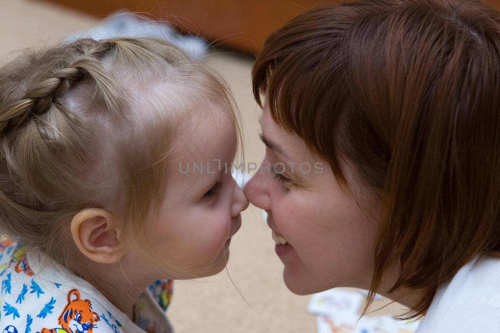 A mother and daughter play