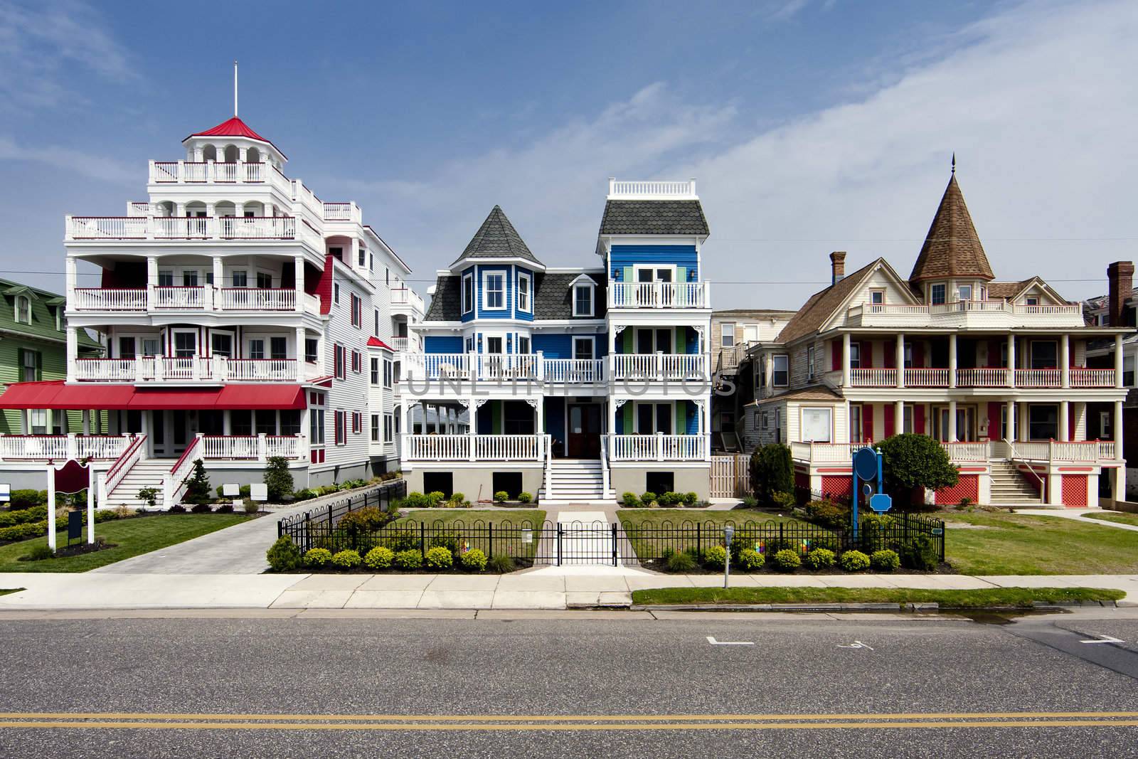 Colorful Victorian style houses by phakimata