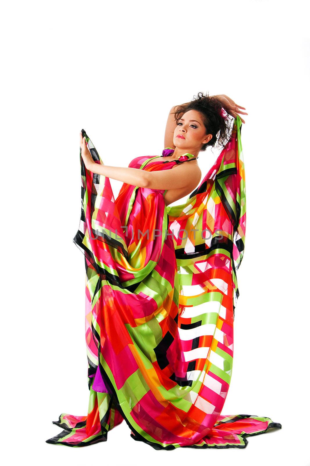 Beautiful Caucasian Hispanic Latina fashion model woman wearing colorful dress, isolated.