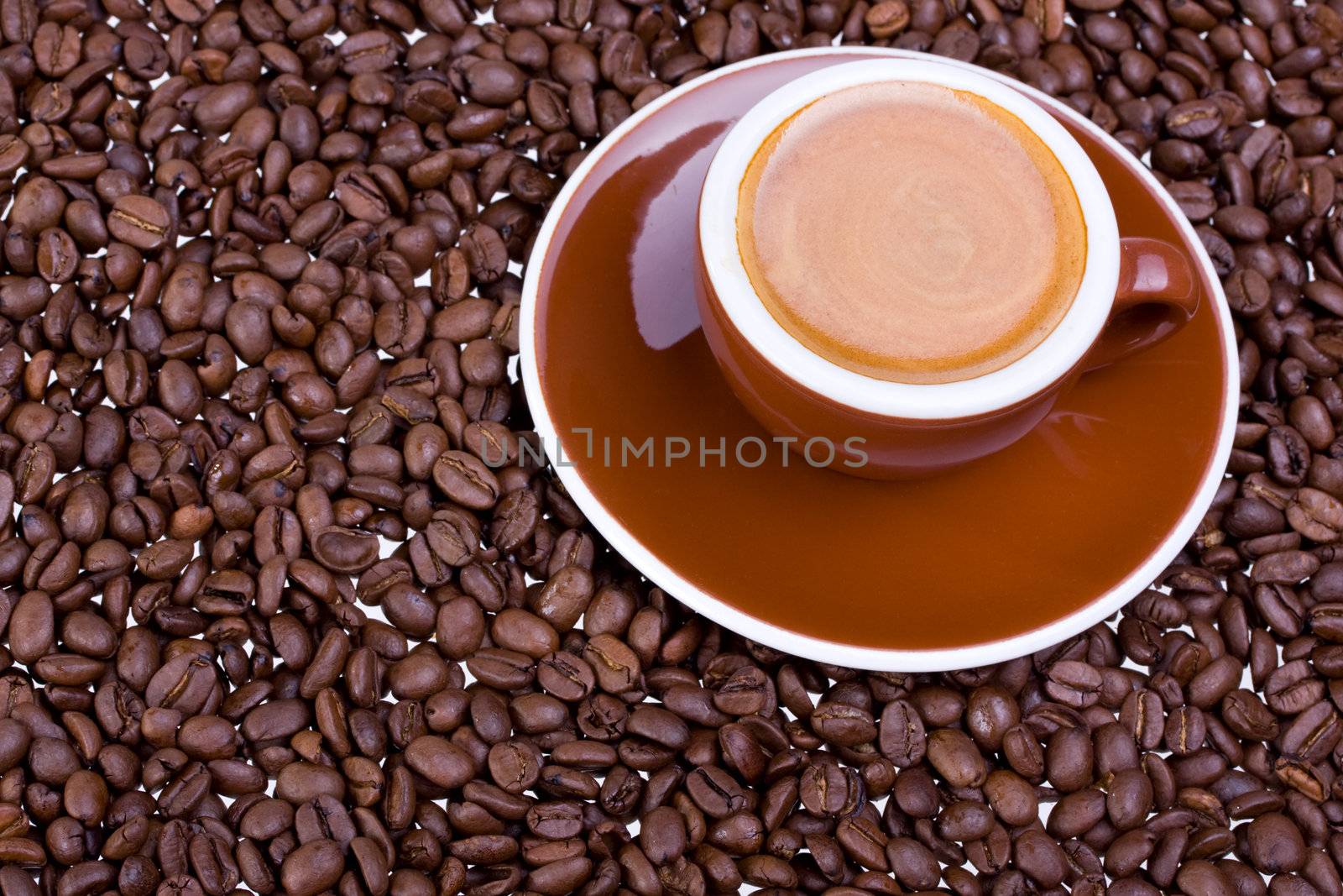 espresso cup and coffee beans on white background