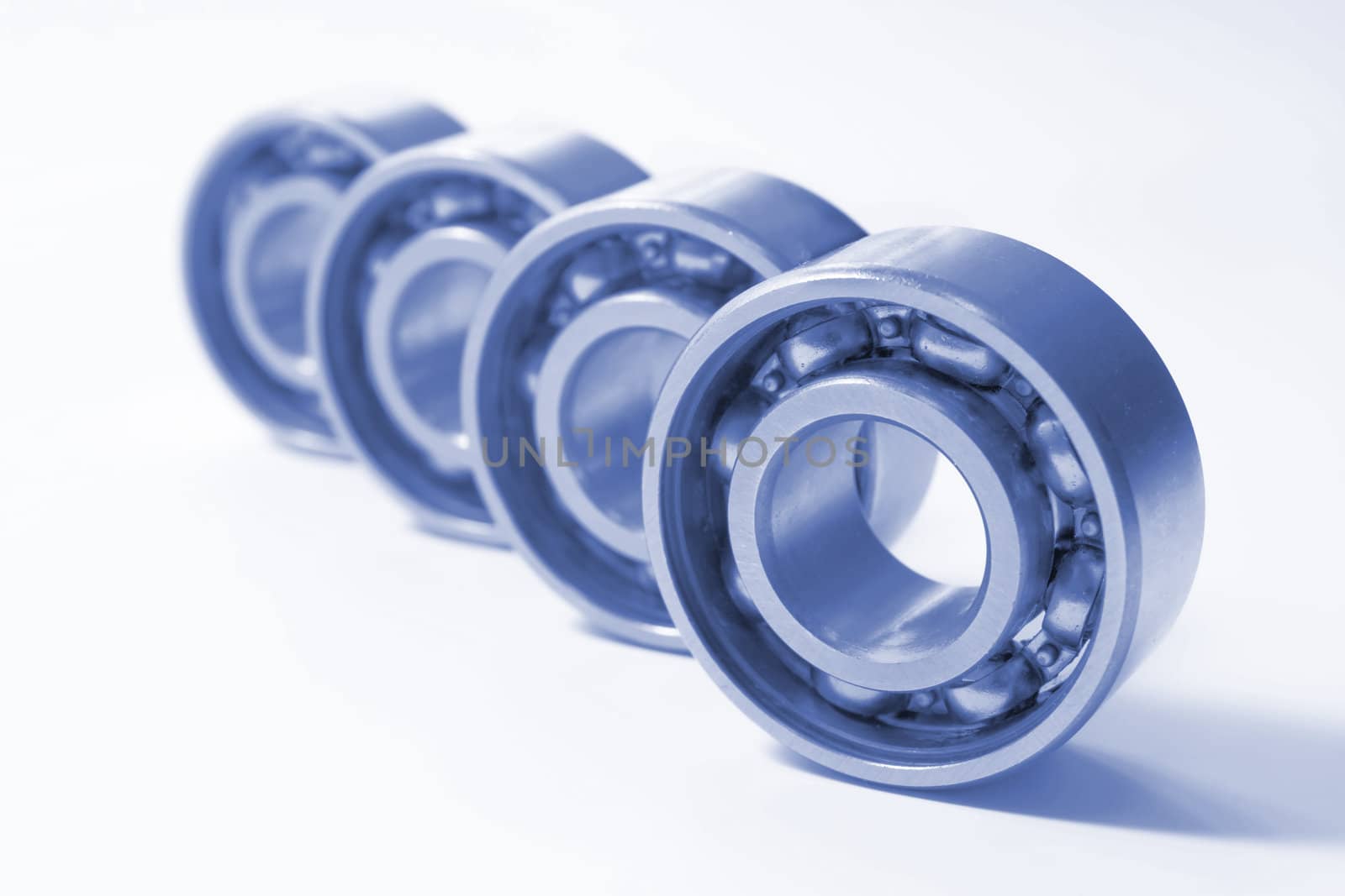 Four bearings. The photo is made by close up and colorized dark blue colour.
