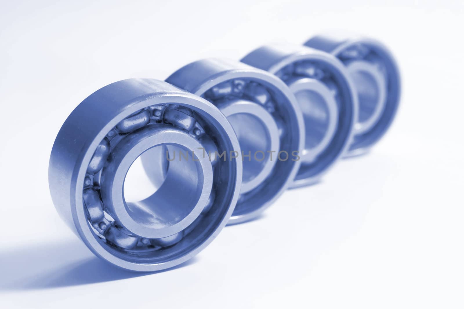 Four bearings. The photo is made by close up and colorized dark blue colour.