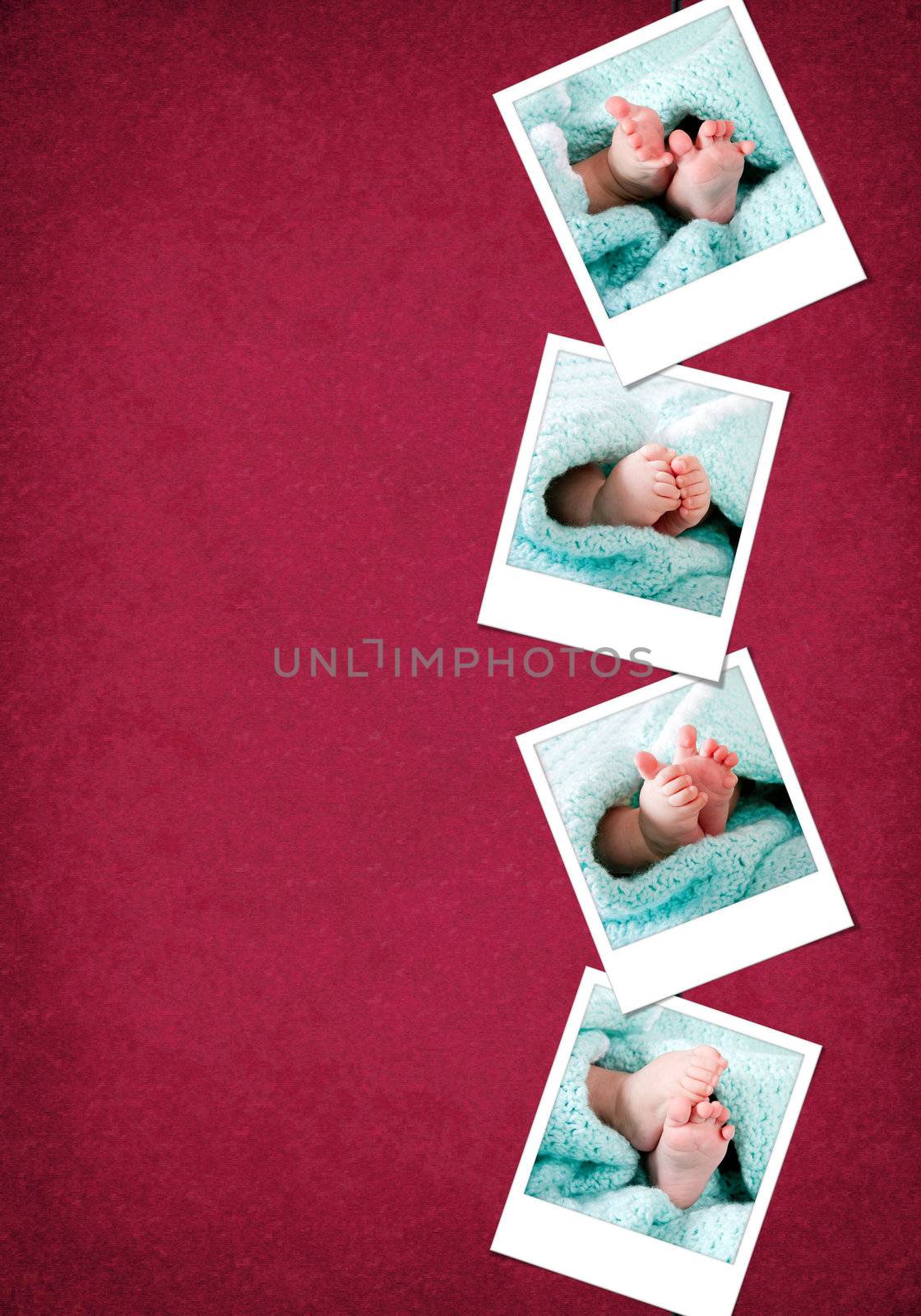 Happy and funny baby feet in blue-green blanket photos hanging vertical on a red-burgundy color grunge background.