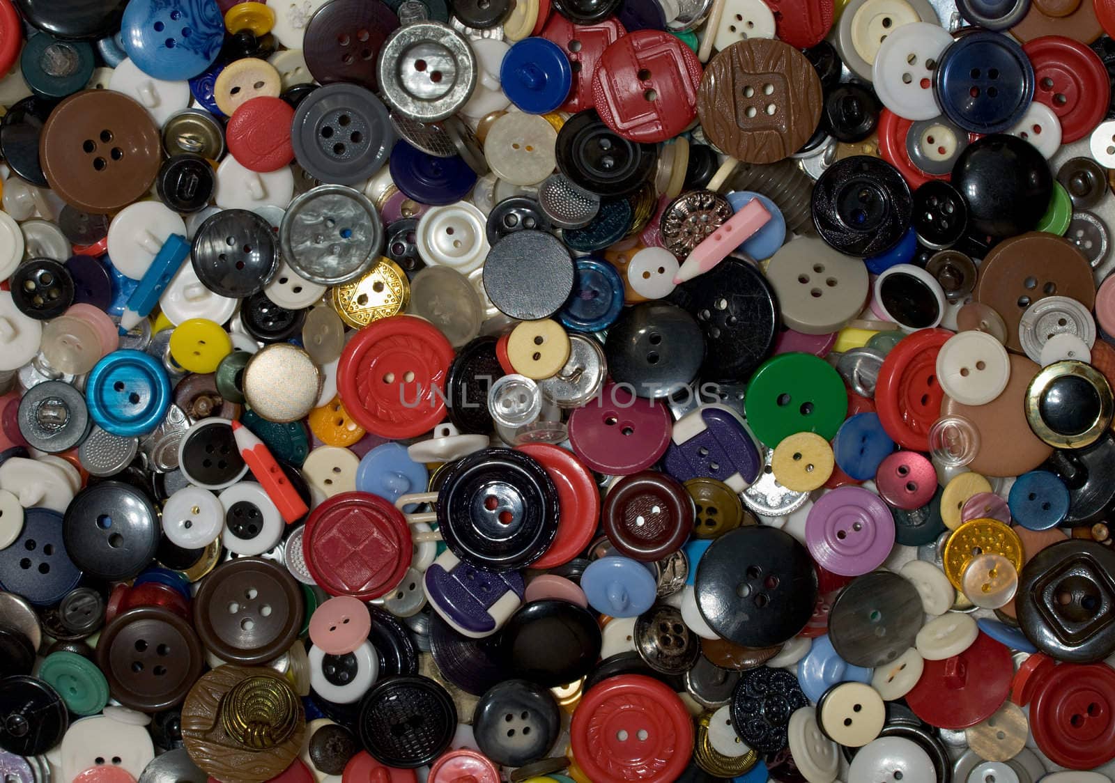 Multicolored plastic button background photographing close-up