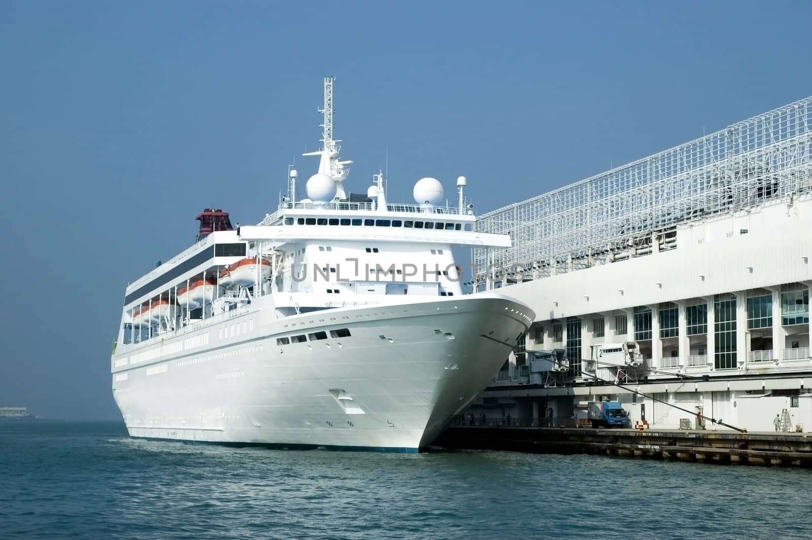 Big passanger's ferry in Hongkong harbour waiting for departure, cruising between Thailand, Vietnam, China and Hongkong.