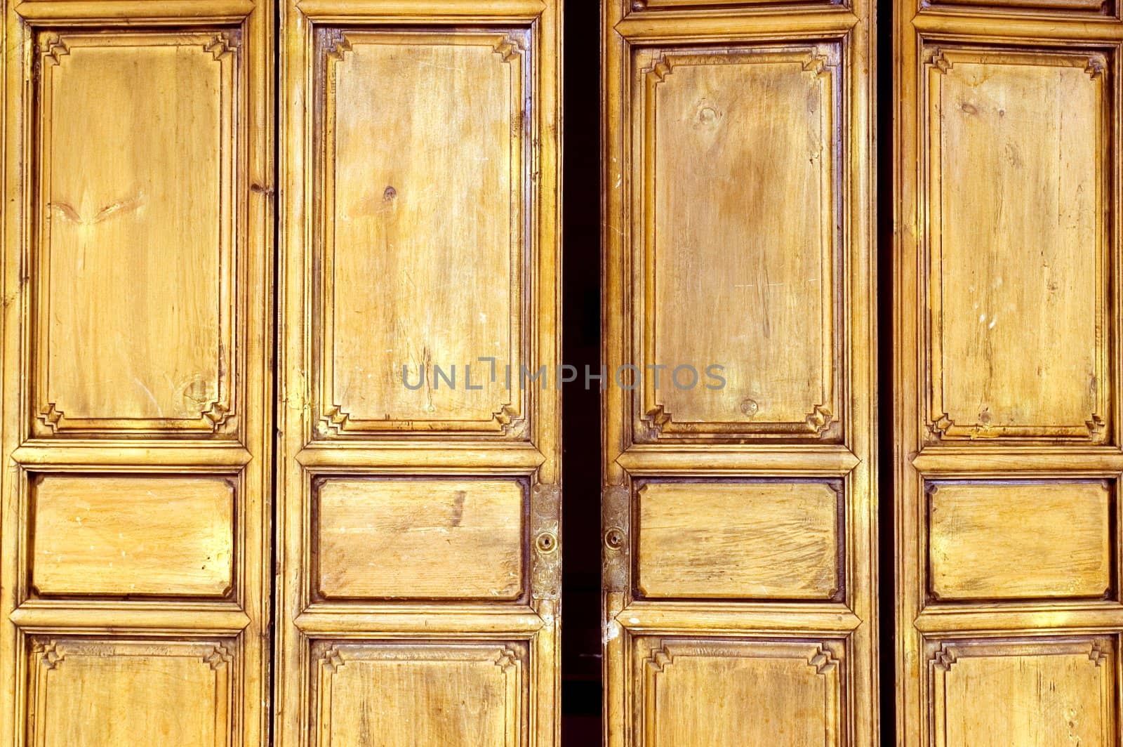 Wooden door in old style, shop entrance. China, Yunnan province, Lijiang - old town. 