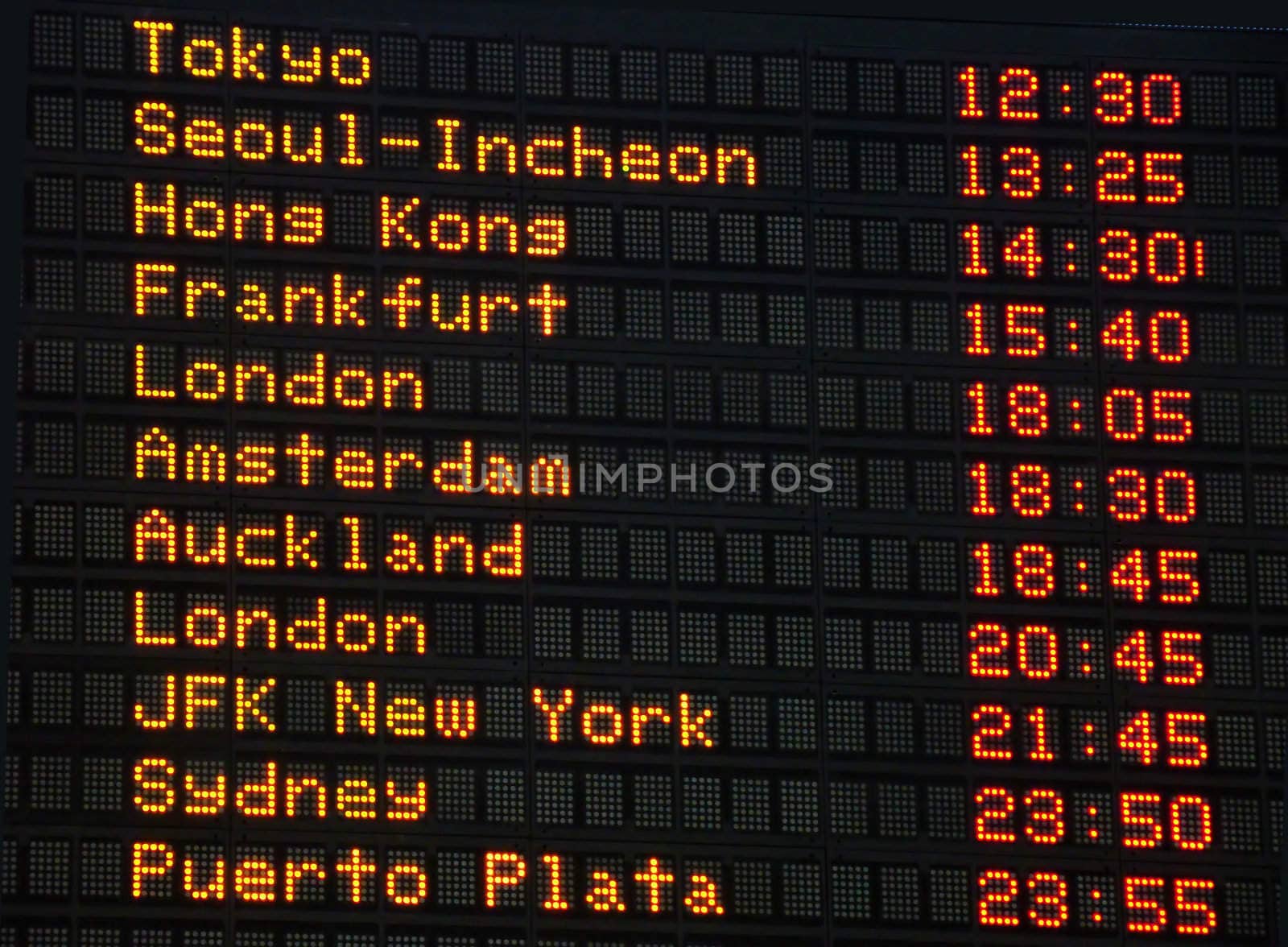 Airport information board, international departures.