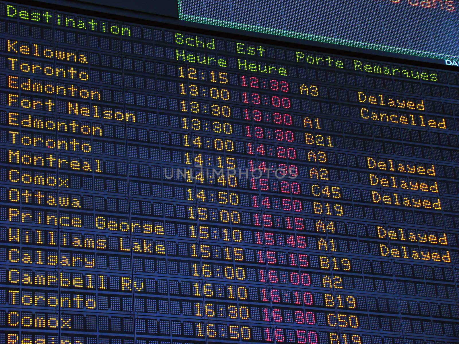 Canadian airport information board, domestic departures.