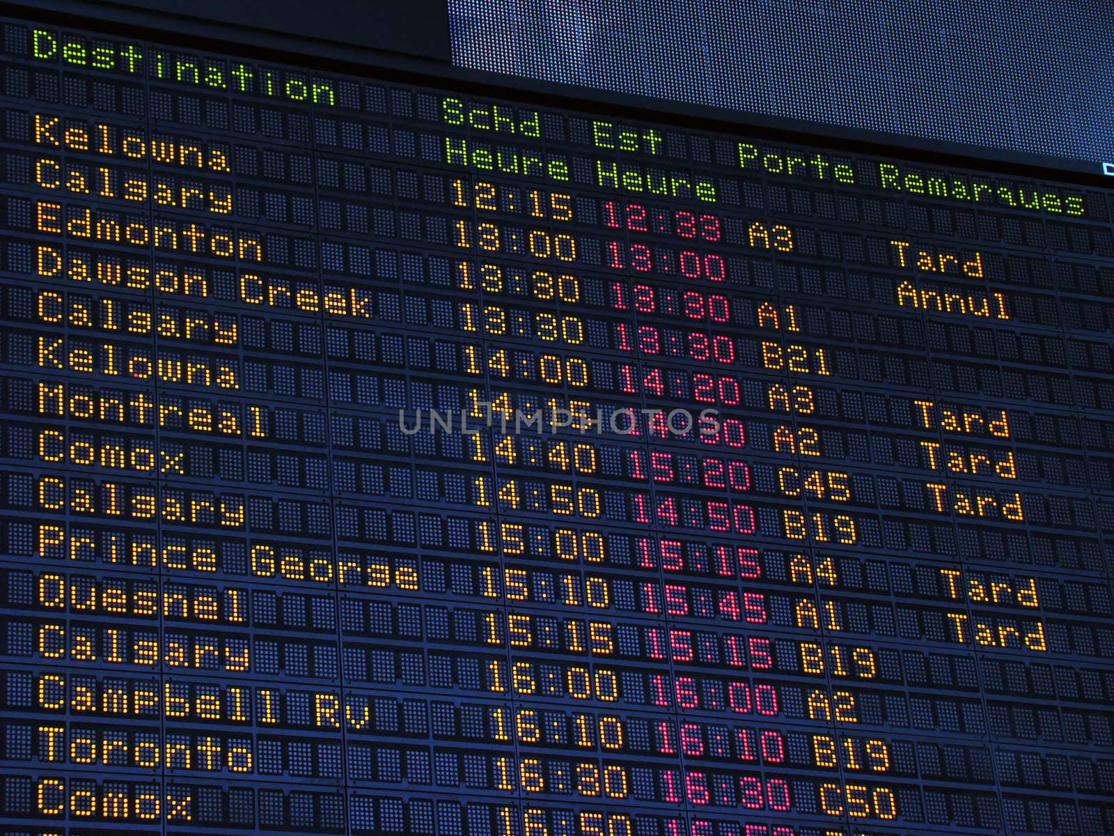 Canadian airport information board, domestic departures.