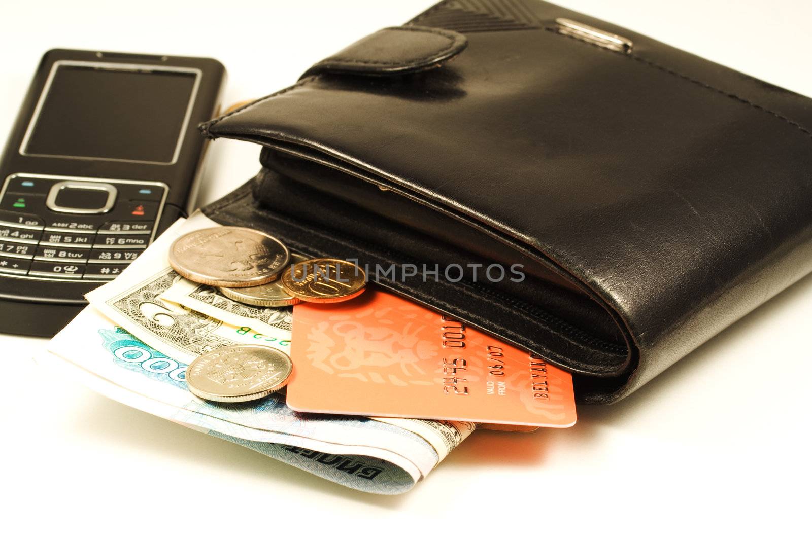 Mobile phone, wallet with cash and credit card o white backgroud