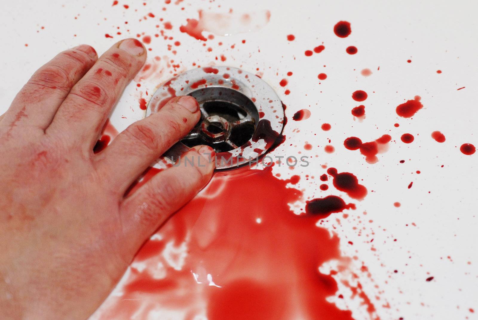 human hand and  blood in a bathroom: suicide in a tub