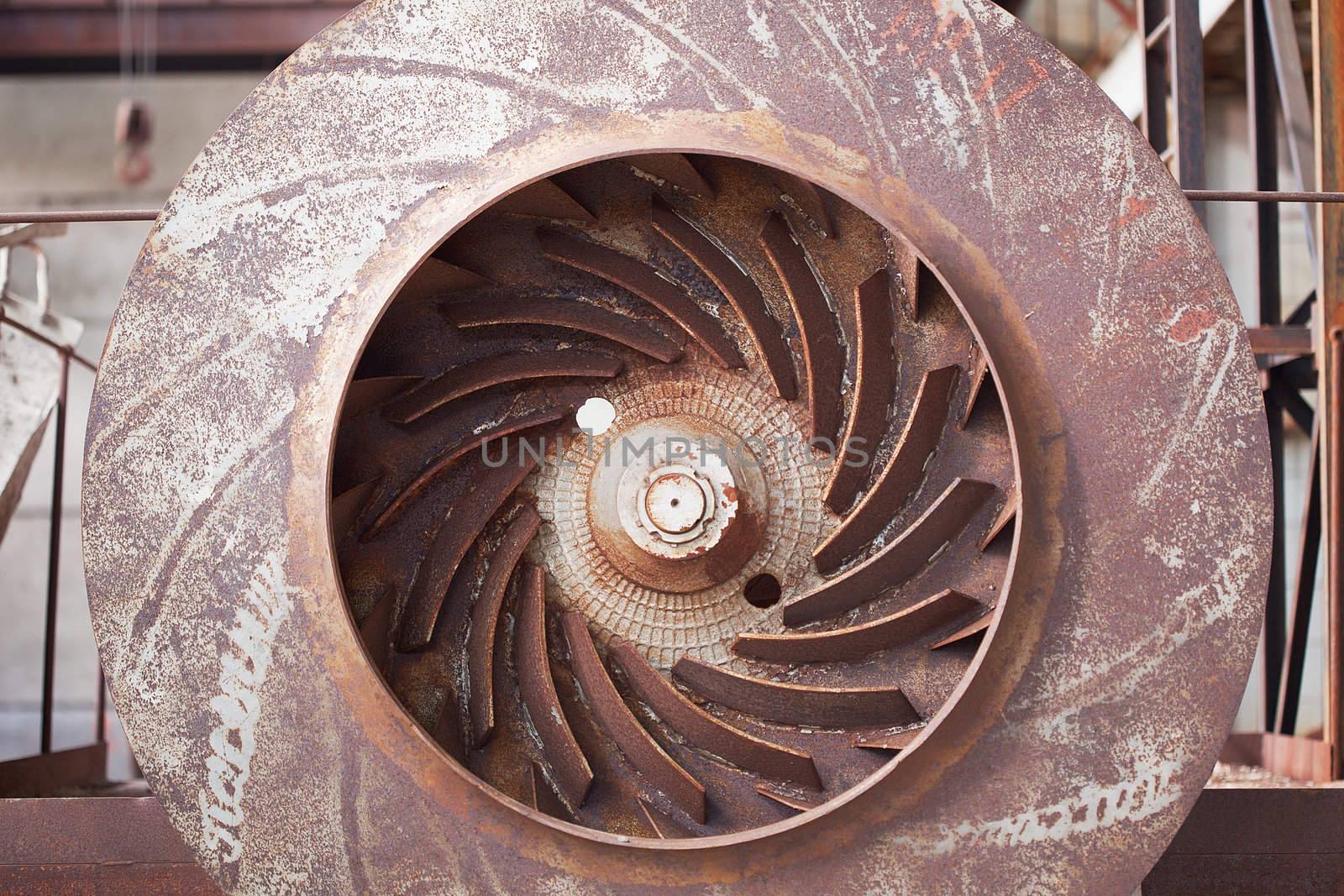 The old rusty big industrial fan close up