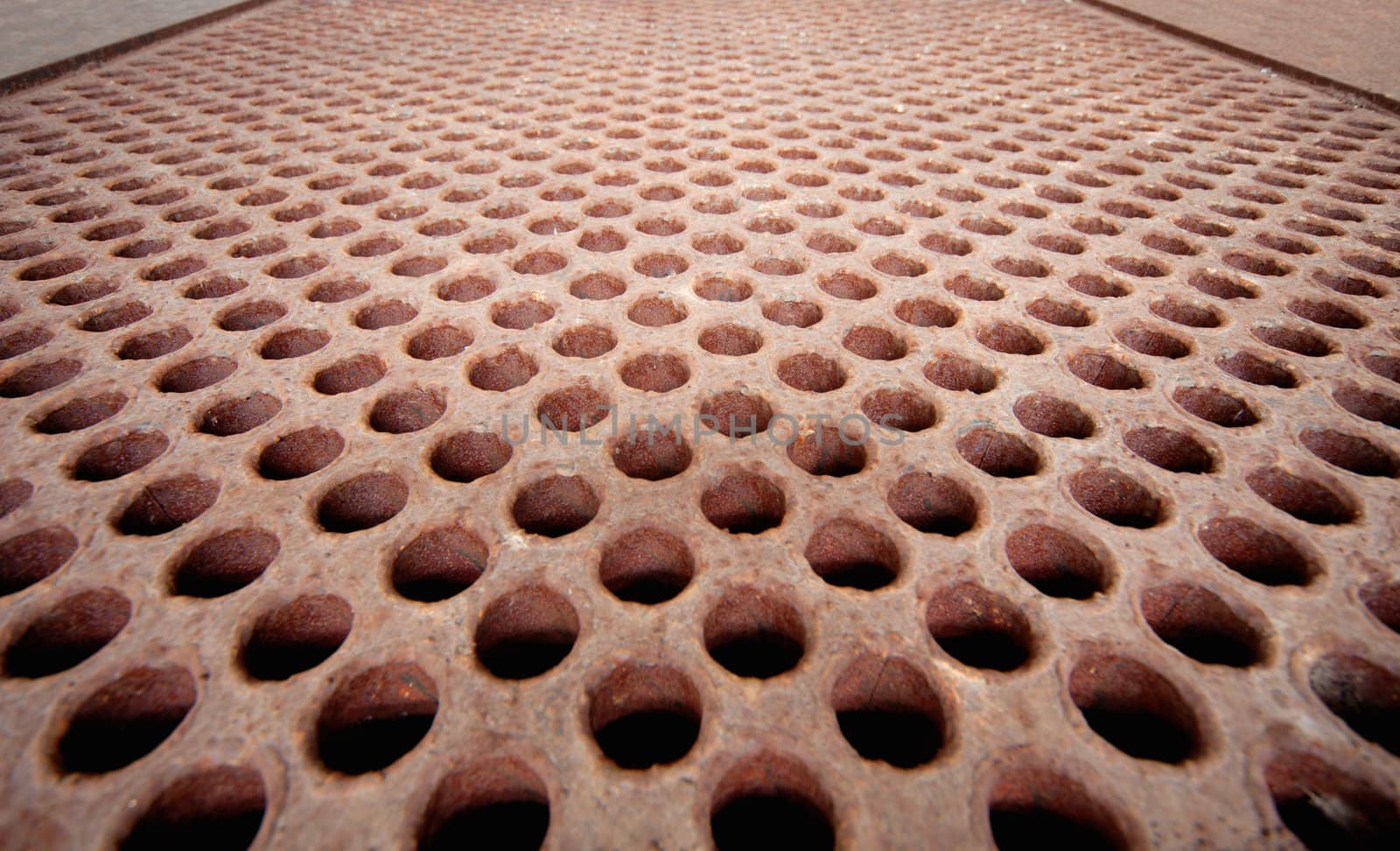 Rusty metal lattice close up - the heat exchanger