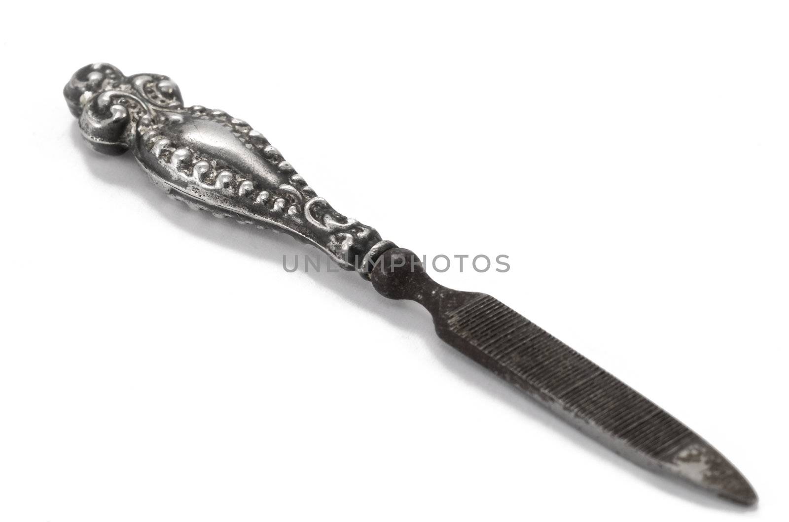 Antique silver nail file with ornate handle