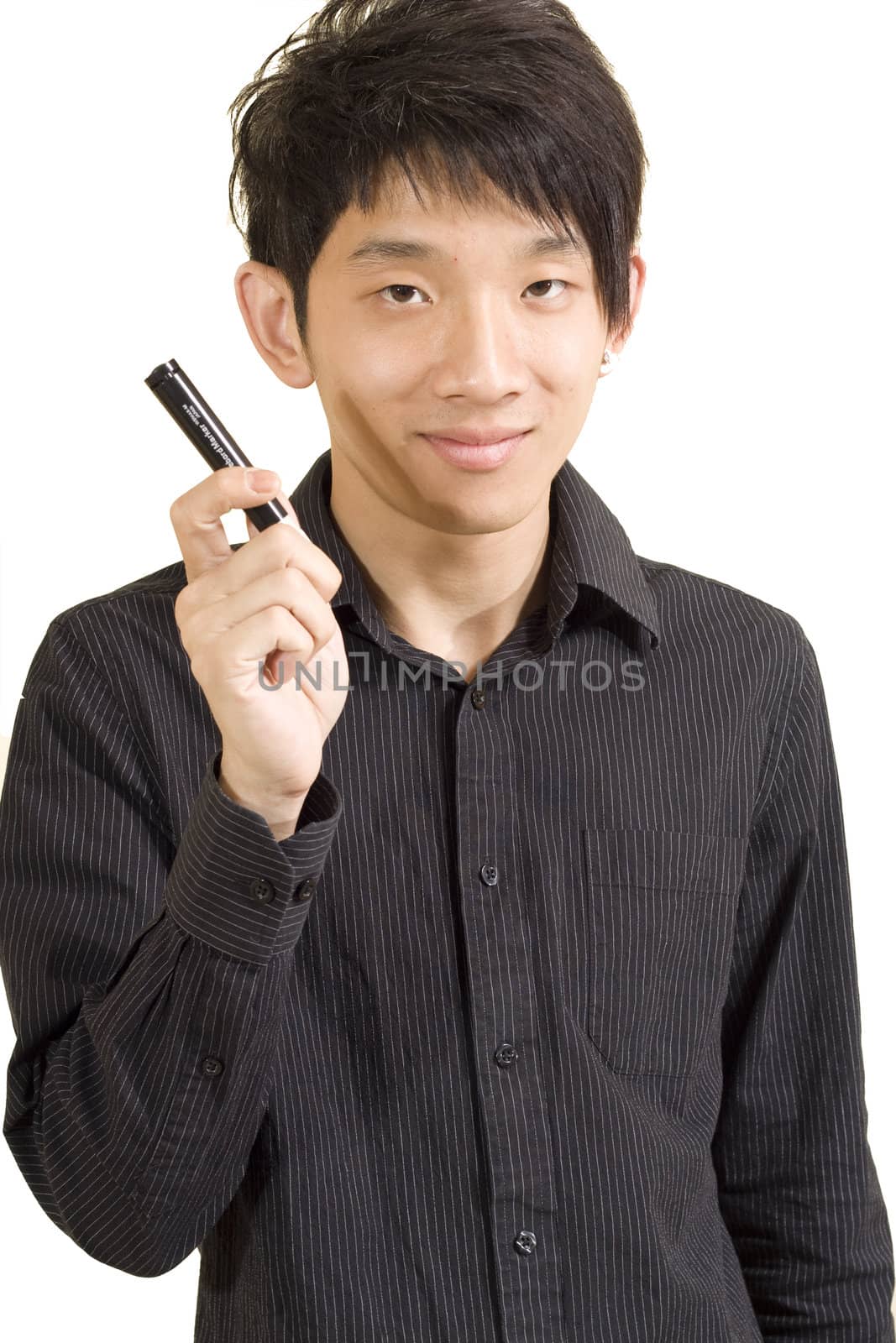 Young Asian man holding pen by cozyta