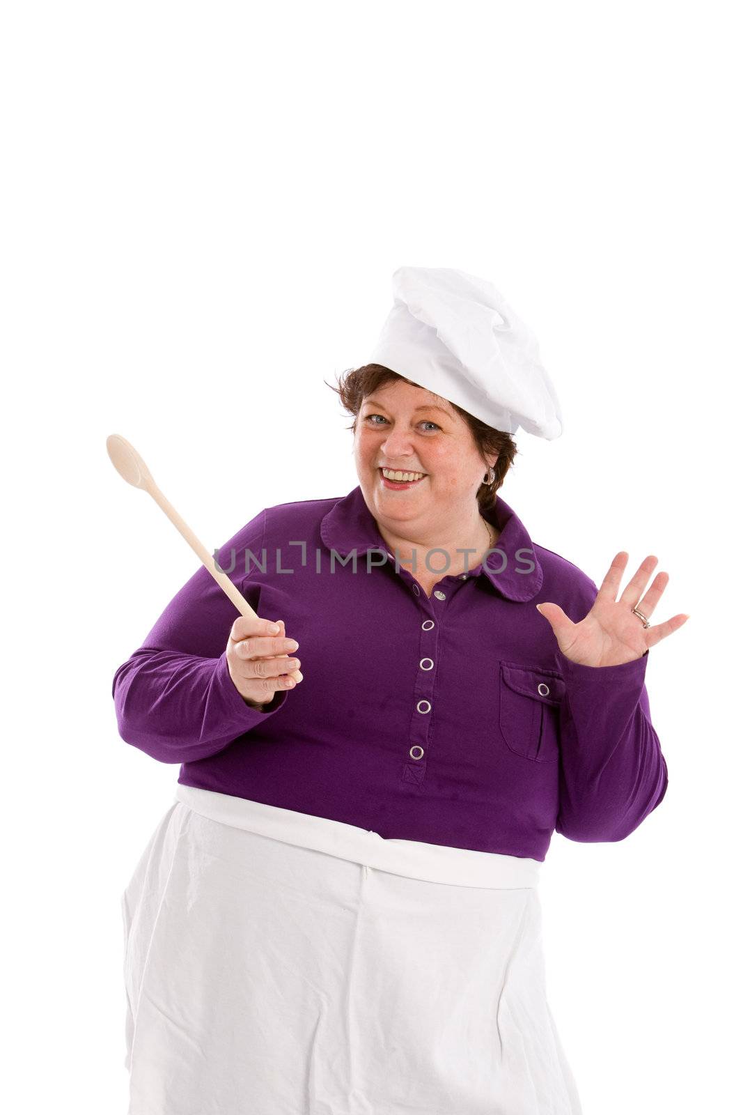 Adorable mature woman with chef's hat and apron on white background