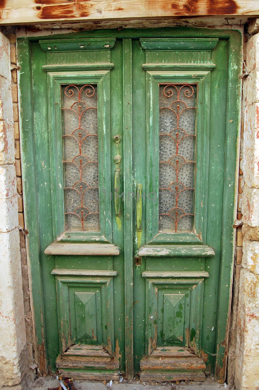 Old, green door by mojly