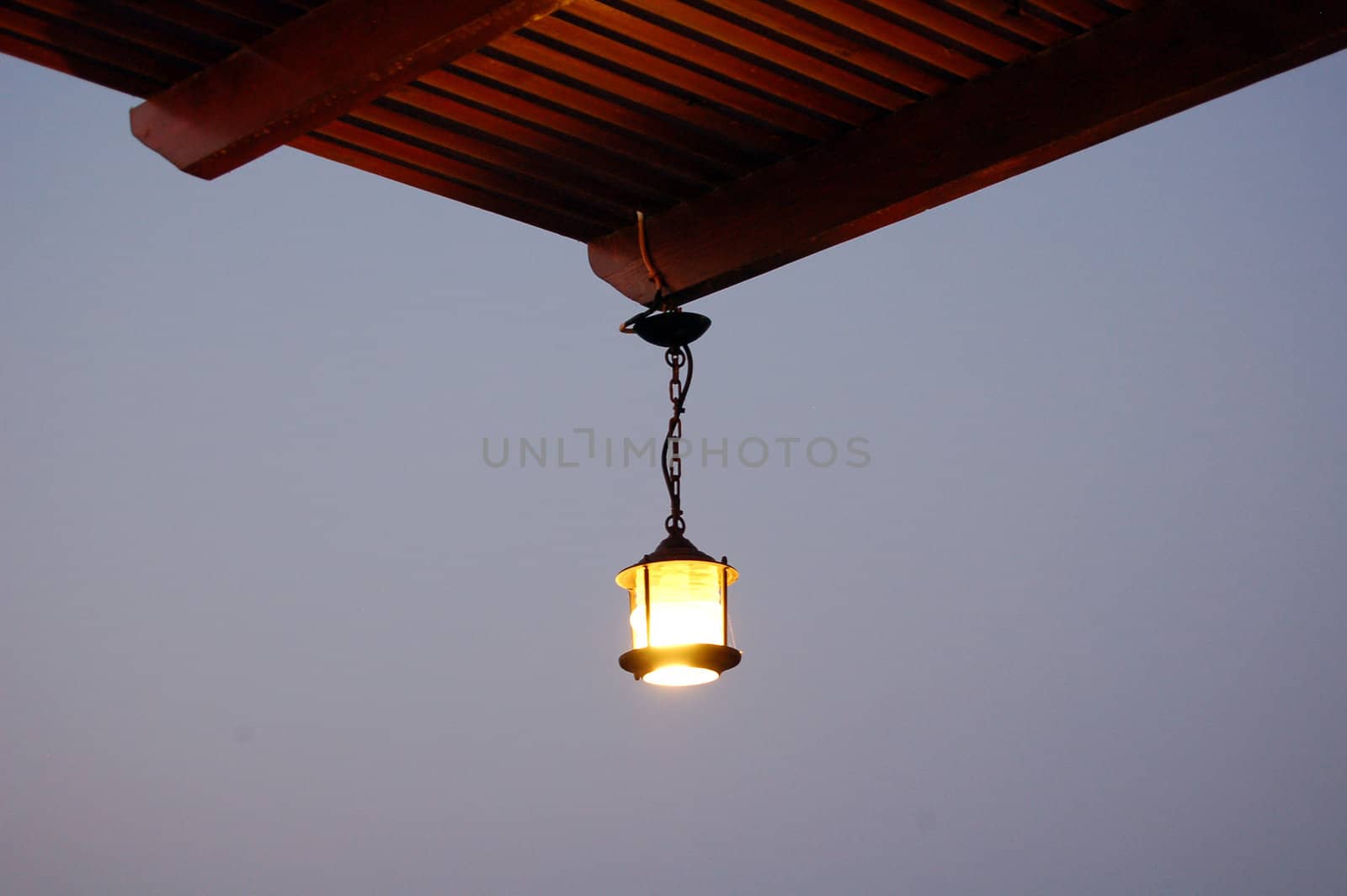 lantern hanging from a roof