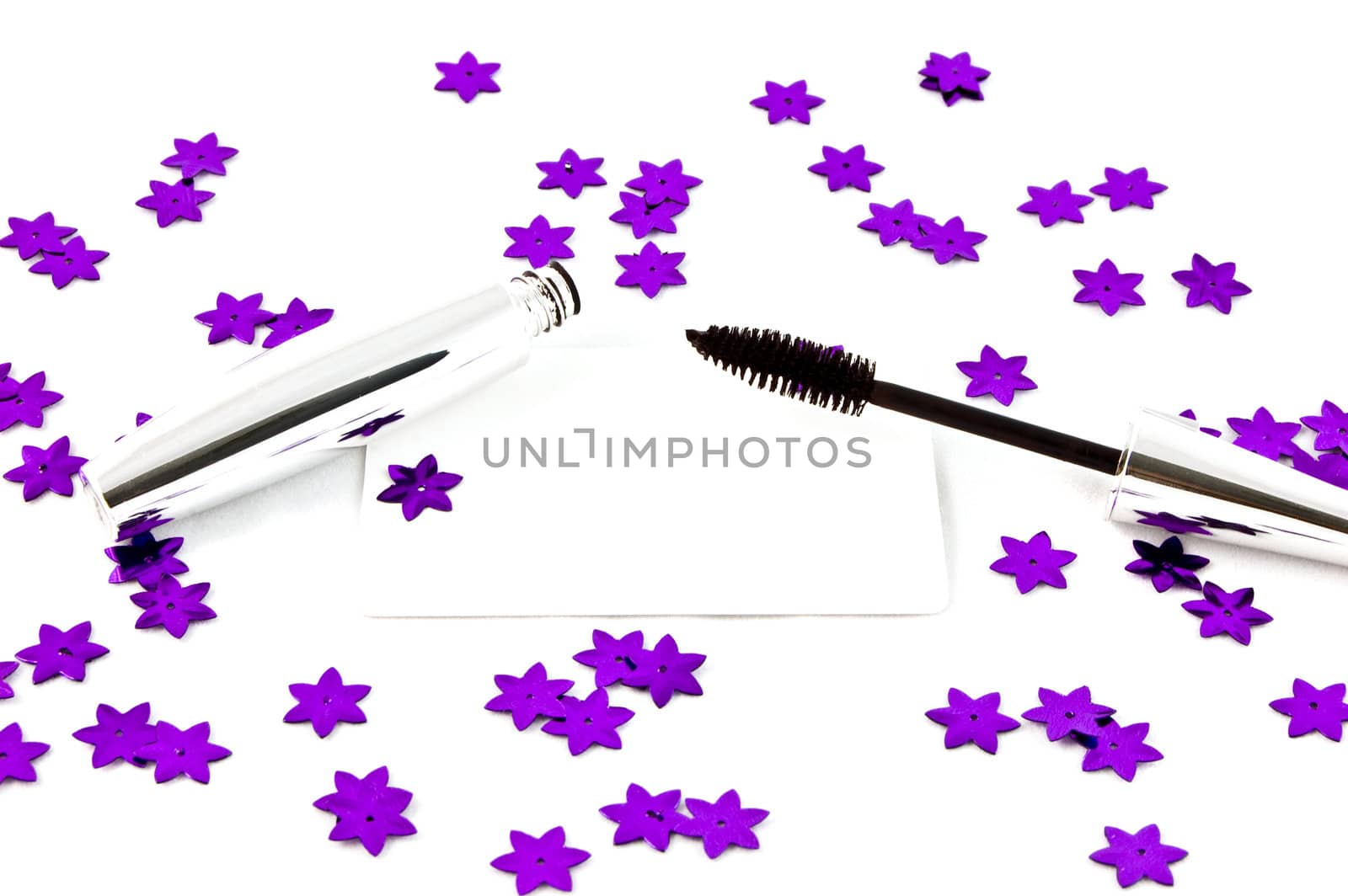 cosmetics with violet stars on white bacground by galcka