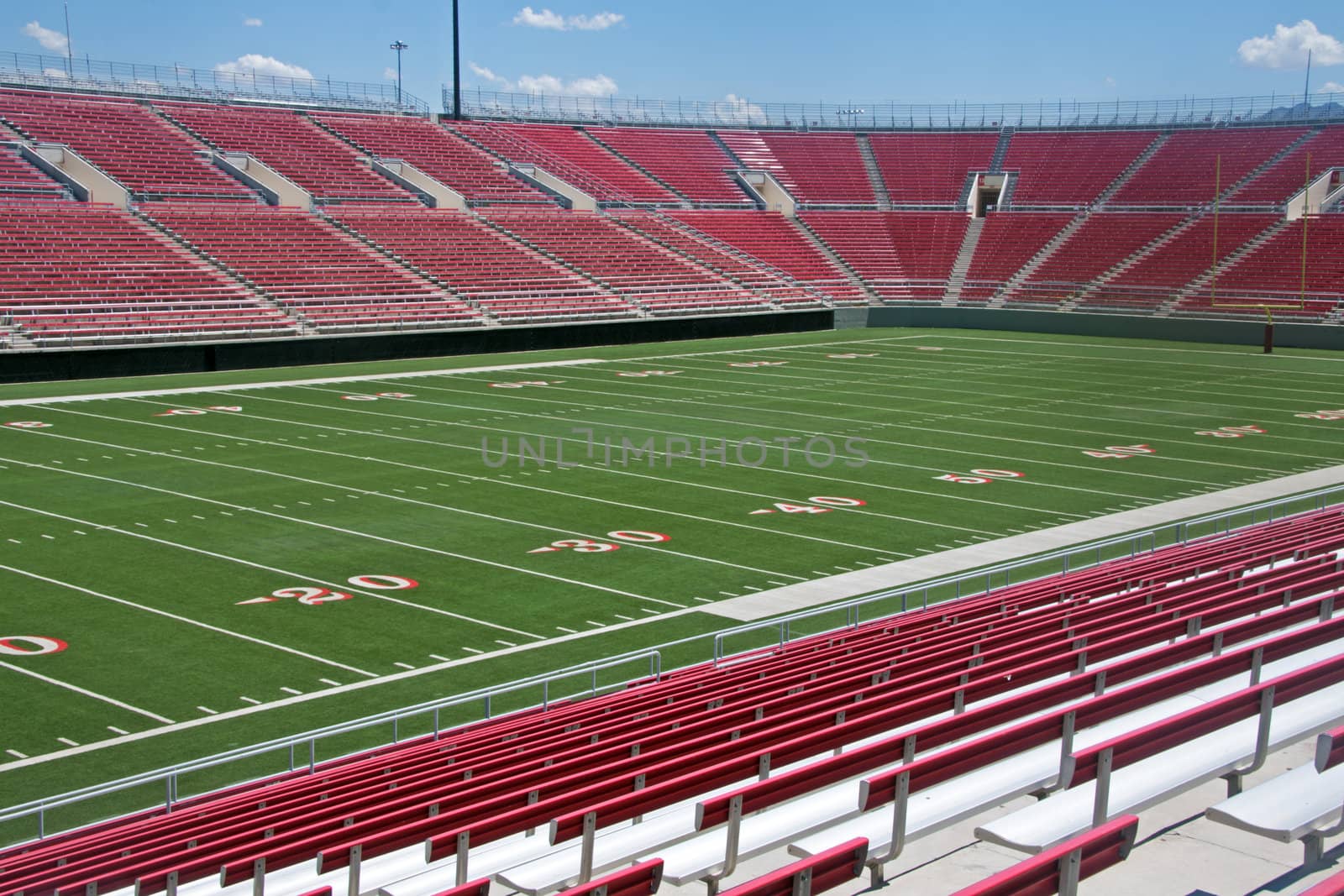 Empty football stadium by GunterNezhoda