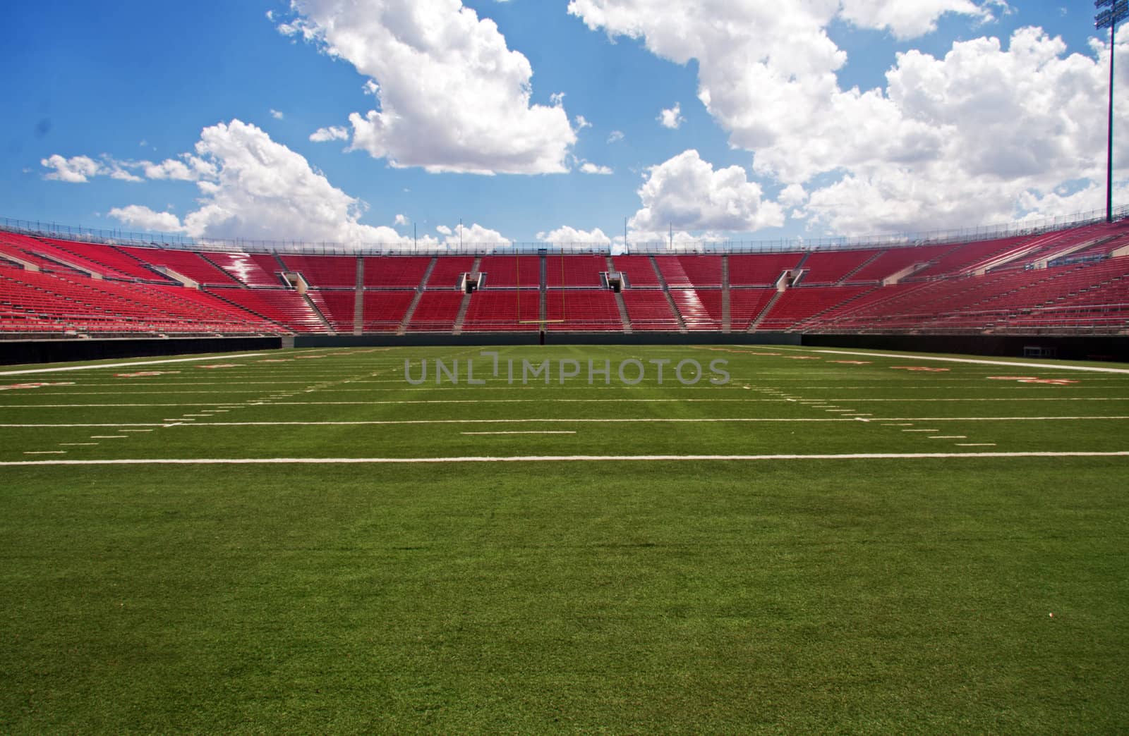 Empty football stadium by GunterNezhoda