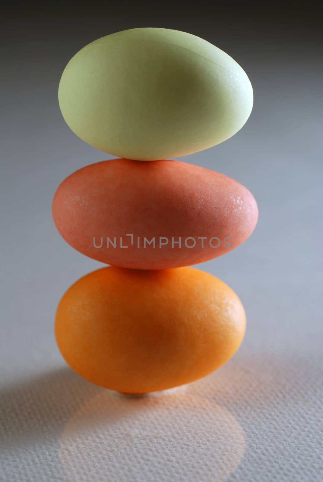 Three candy eggs stacked on top of one another