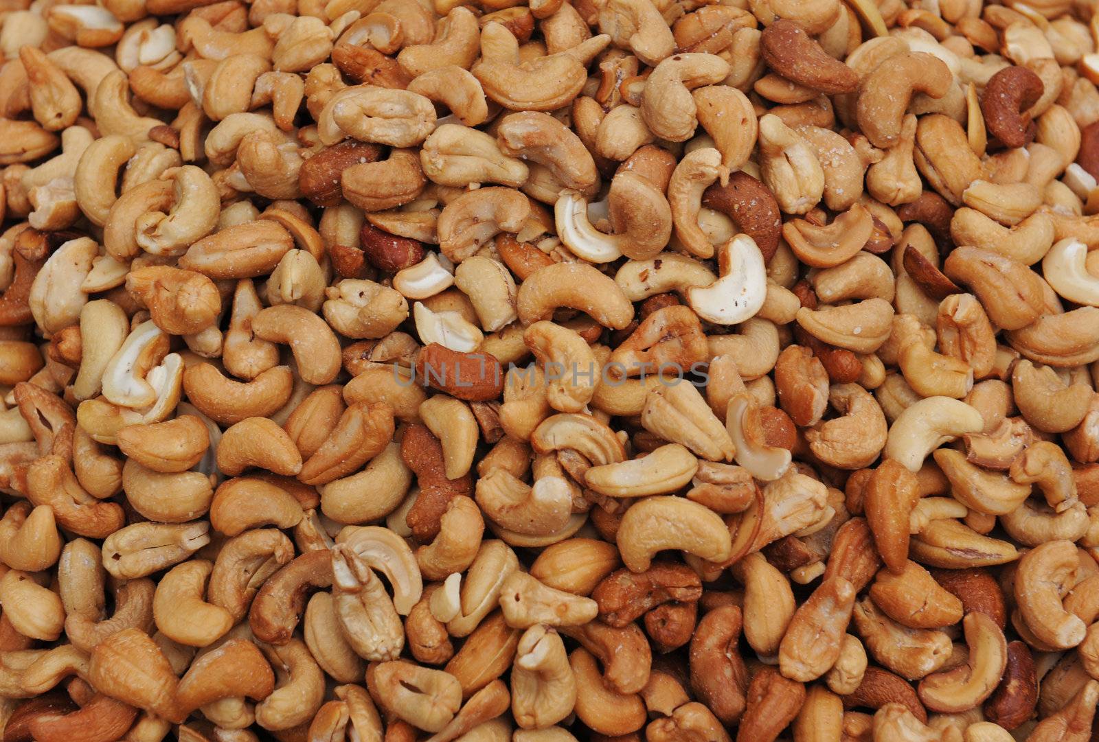 A macro background of healthy cashew nuts.