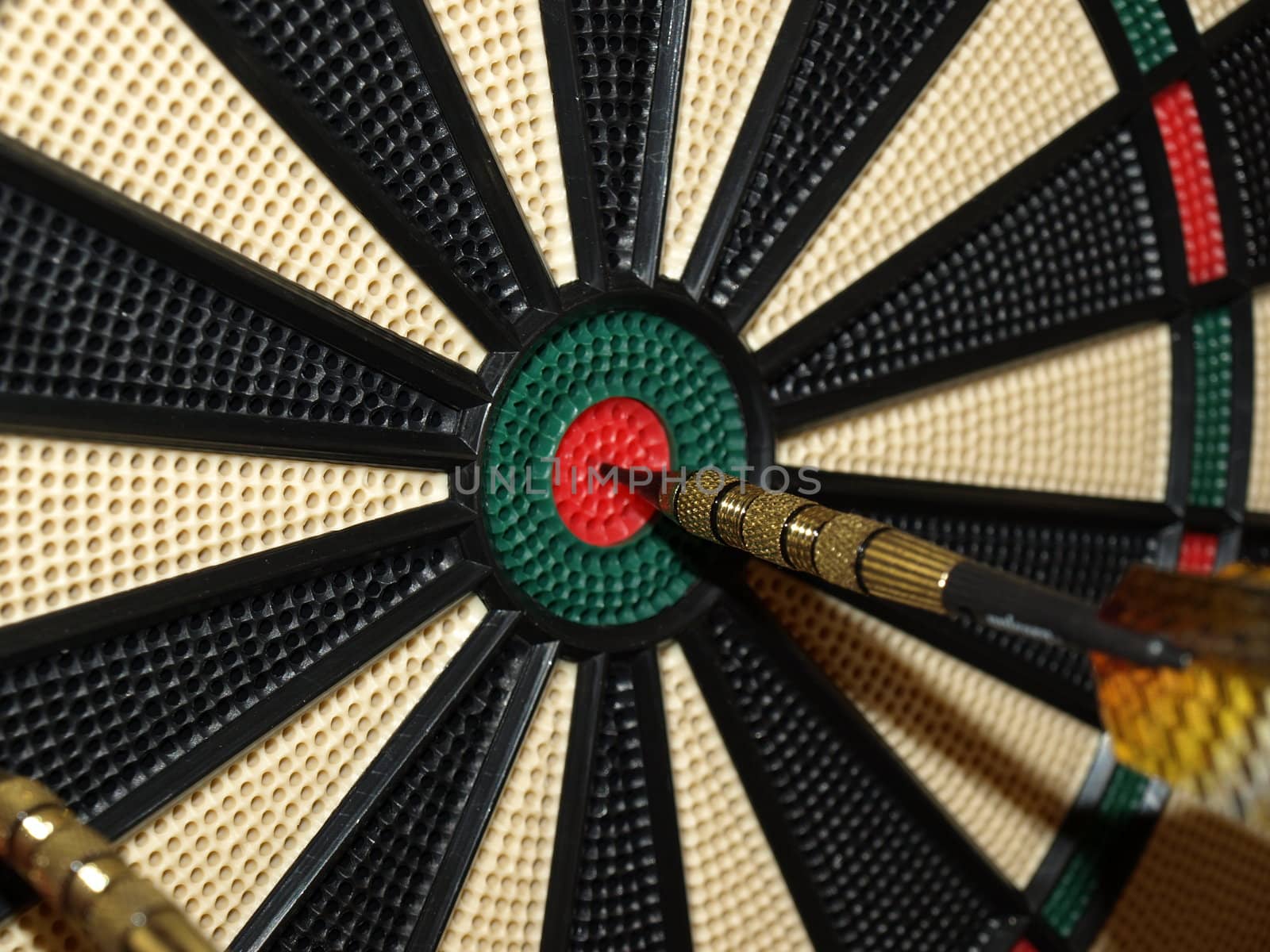 a dart thrown at dead center of the board